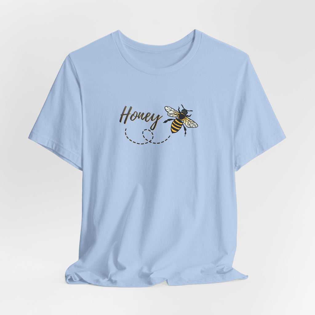 Light blue t-shirt with a bee and 'Honey' text design on a light gray background