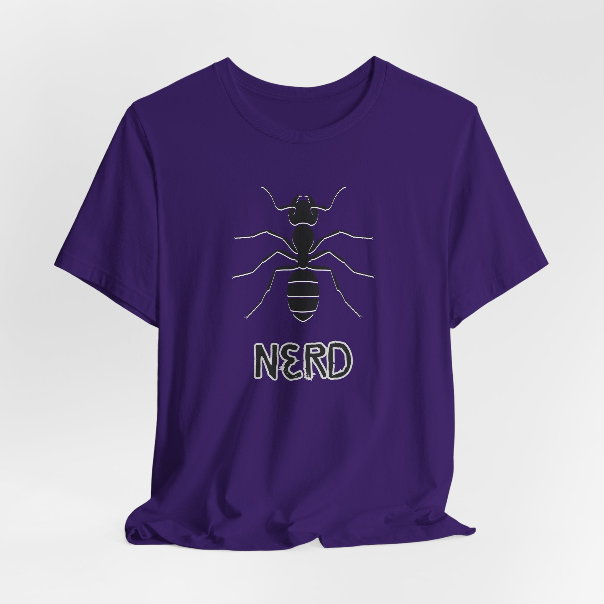 Purple t-shirt with an ant design and text nerd on a light gray background