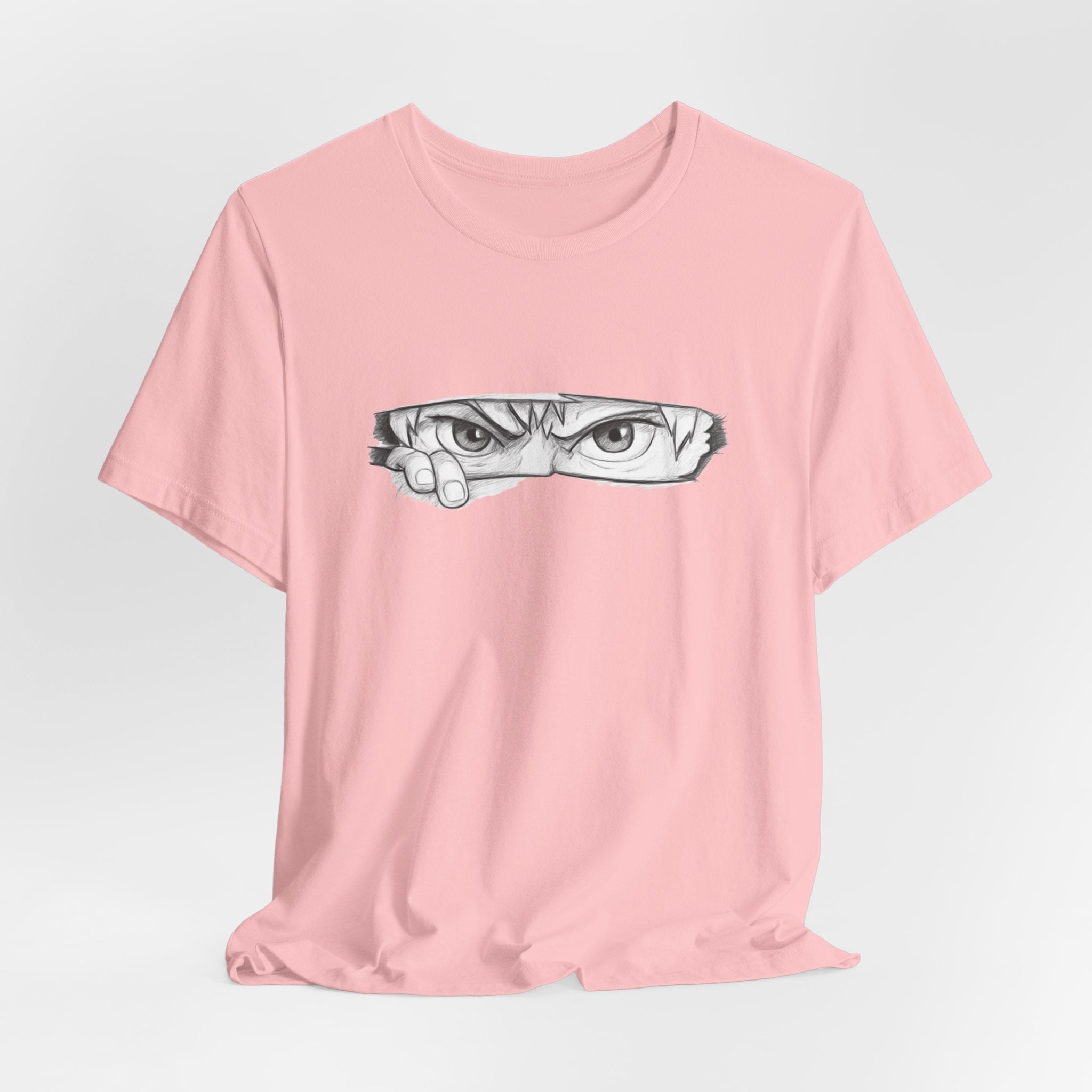 Pink t-shirt with a graphic design on a light gray background