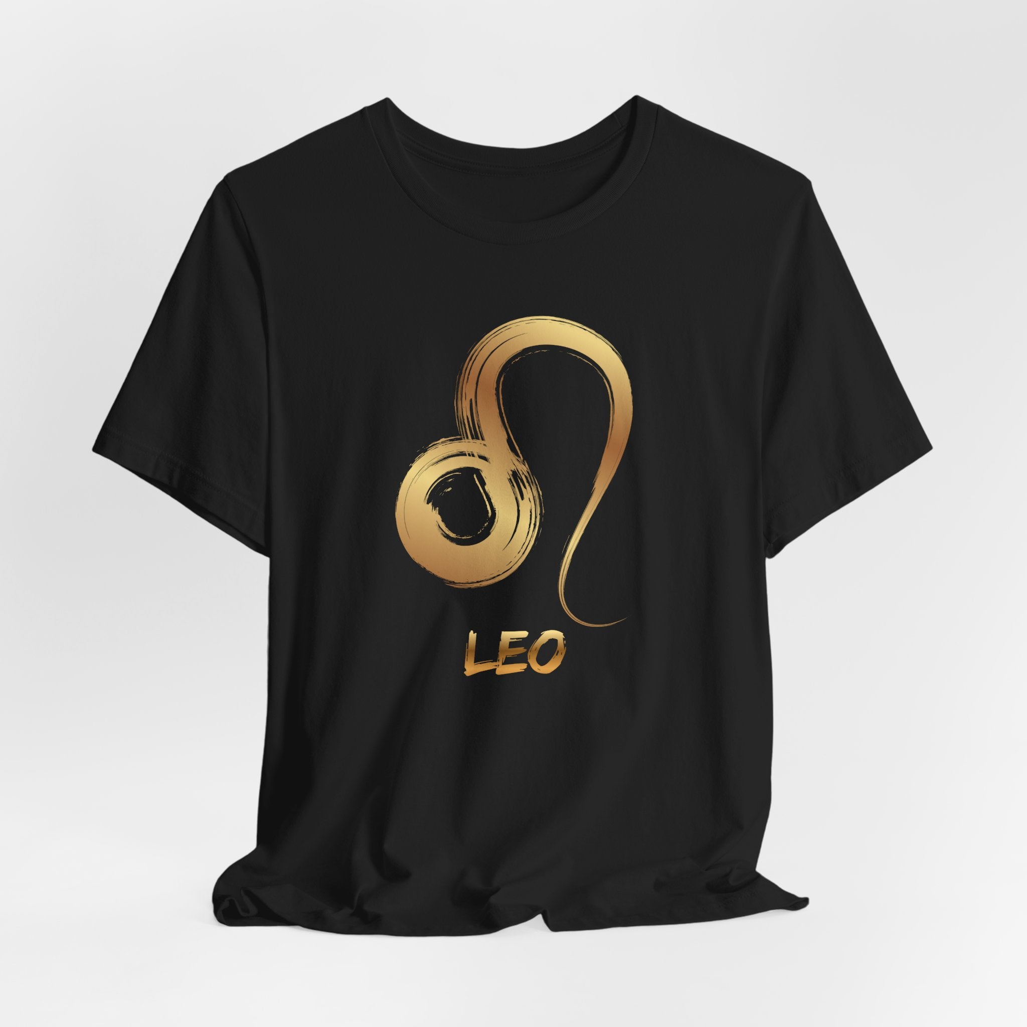 Black t-shirt with a gold Leo zodiac symbol on a white background