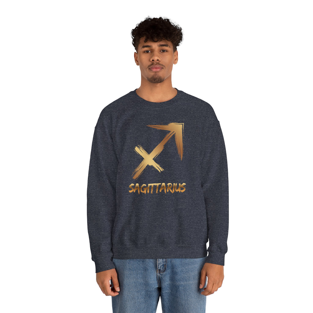 Person wearing a dark blue sweatshirt with a gold Sagittarius symbol on a white background