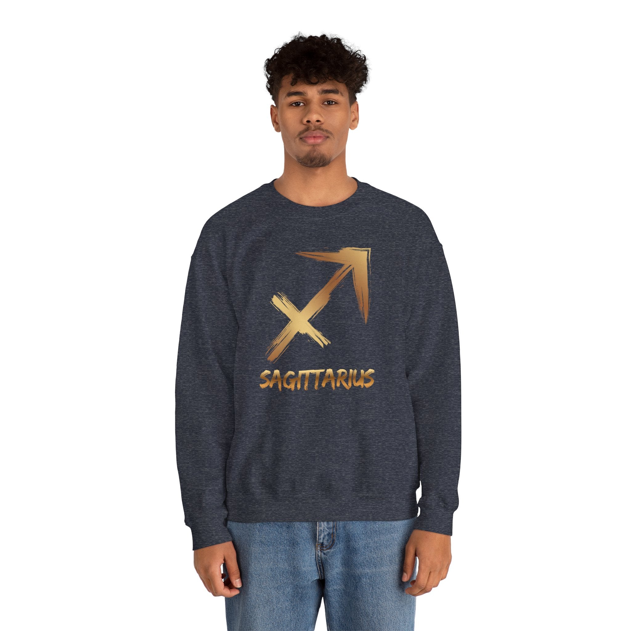 Person wearing a dark blue sweatshirt with a gold Sagittarius symbol on a white background