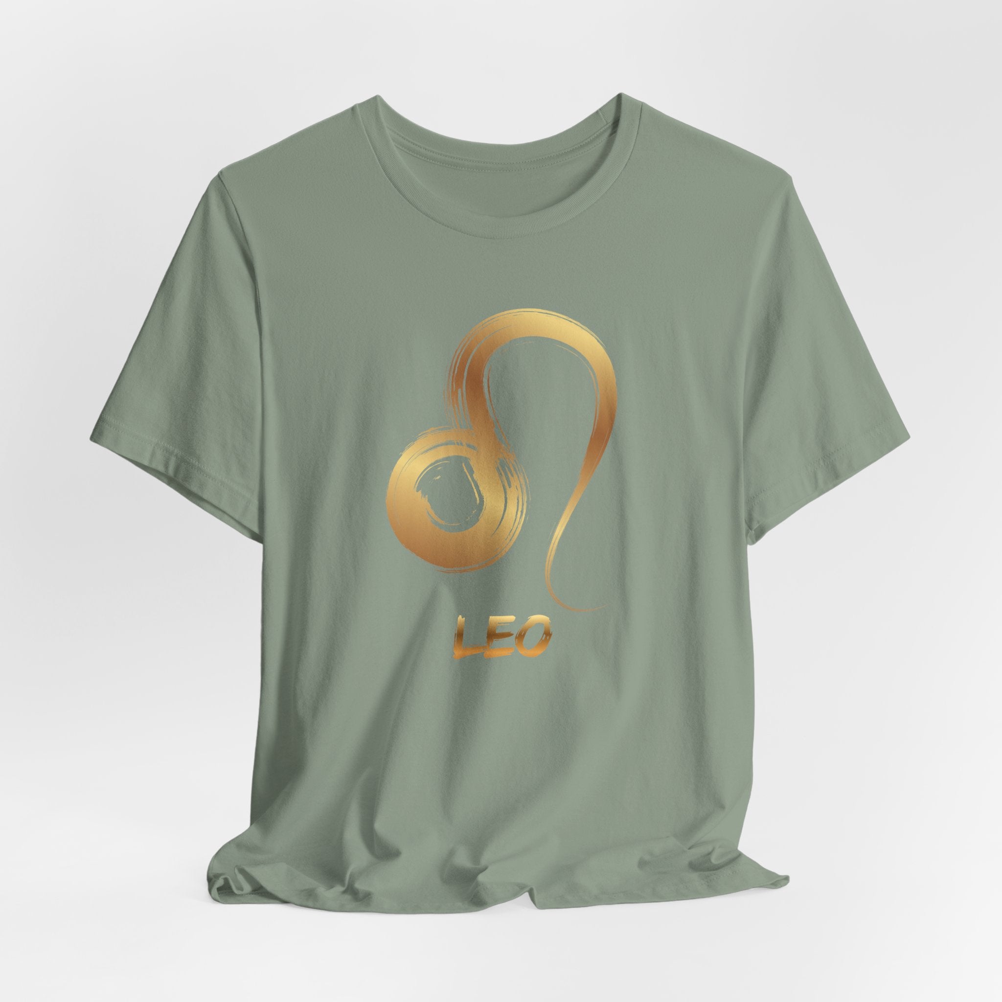 Green t-shirt with a gold Leo zodiac symbol on a light gray background