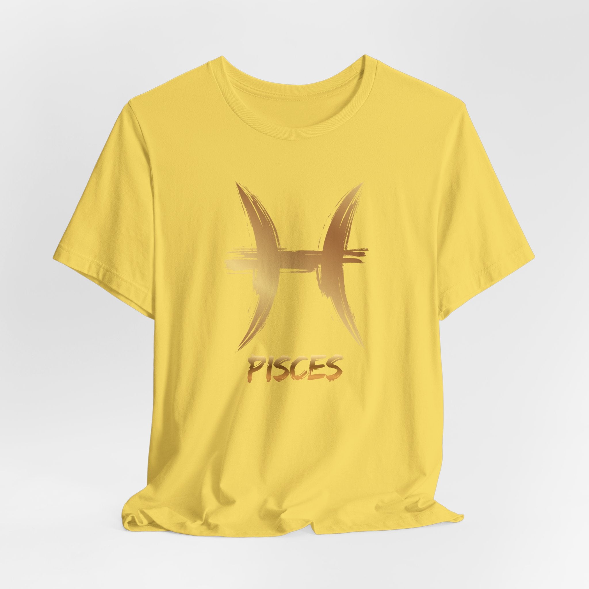 Yellow t-shirt with Pisces zodiac symbol on a light gray background