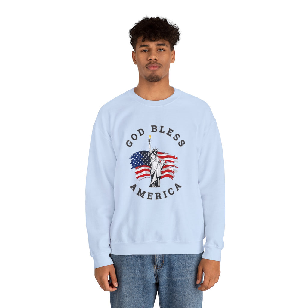 Person wearing a light blue sweatshirt with 'God Bless America' graphic on a white background