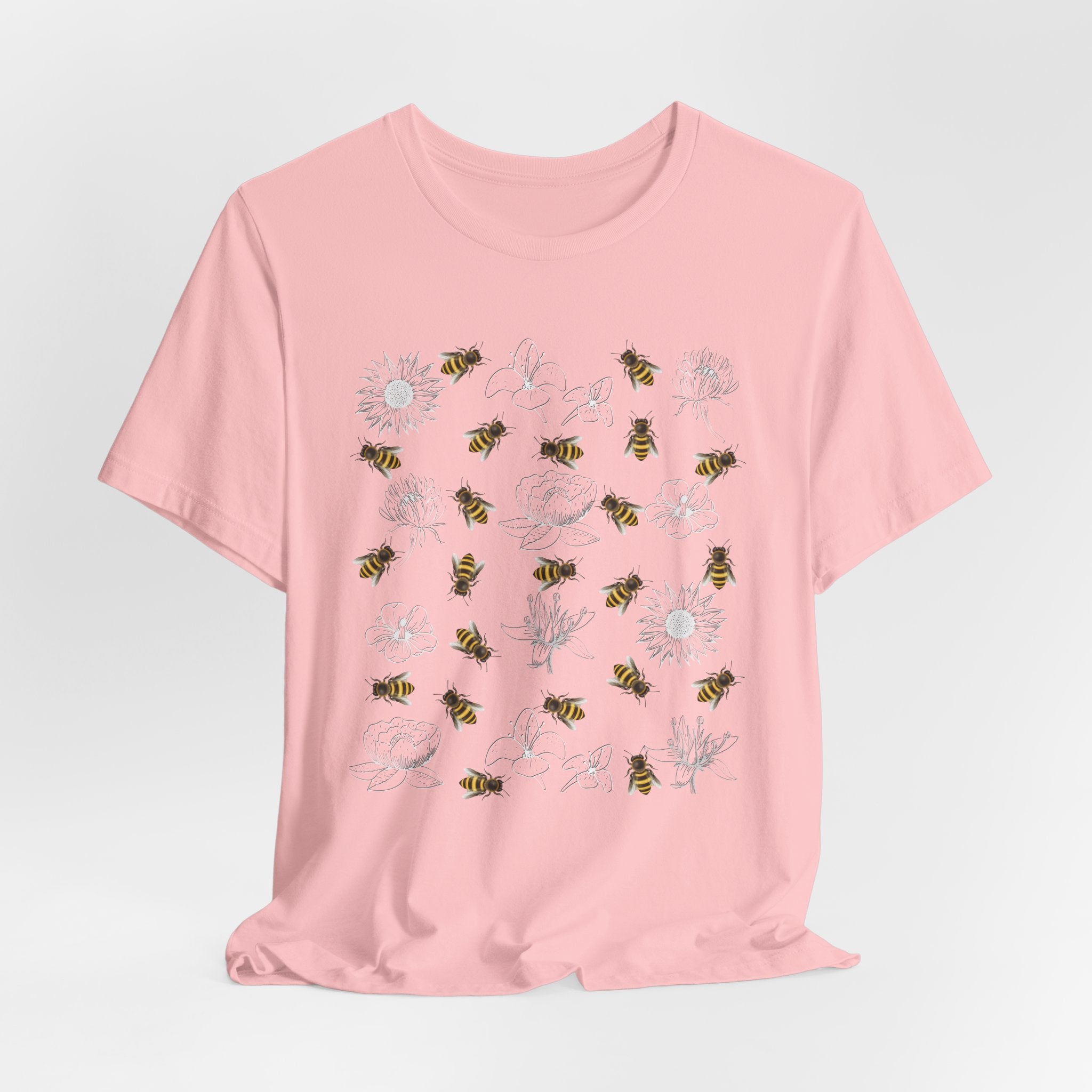 Pink t-shirt with bee and flower on a white background