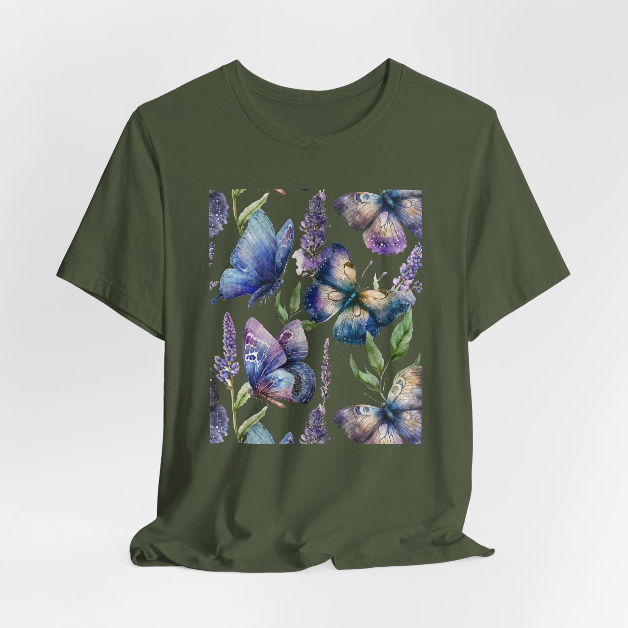 Green t-shirt with blue butterfly design on a white background