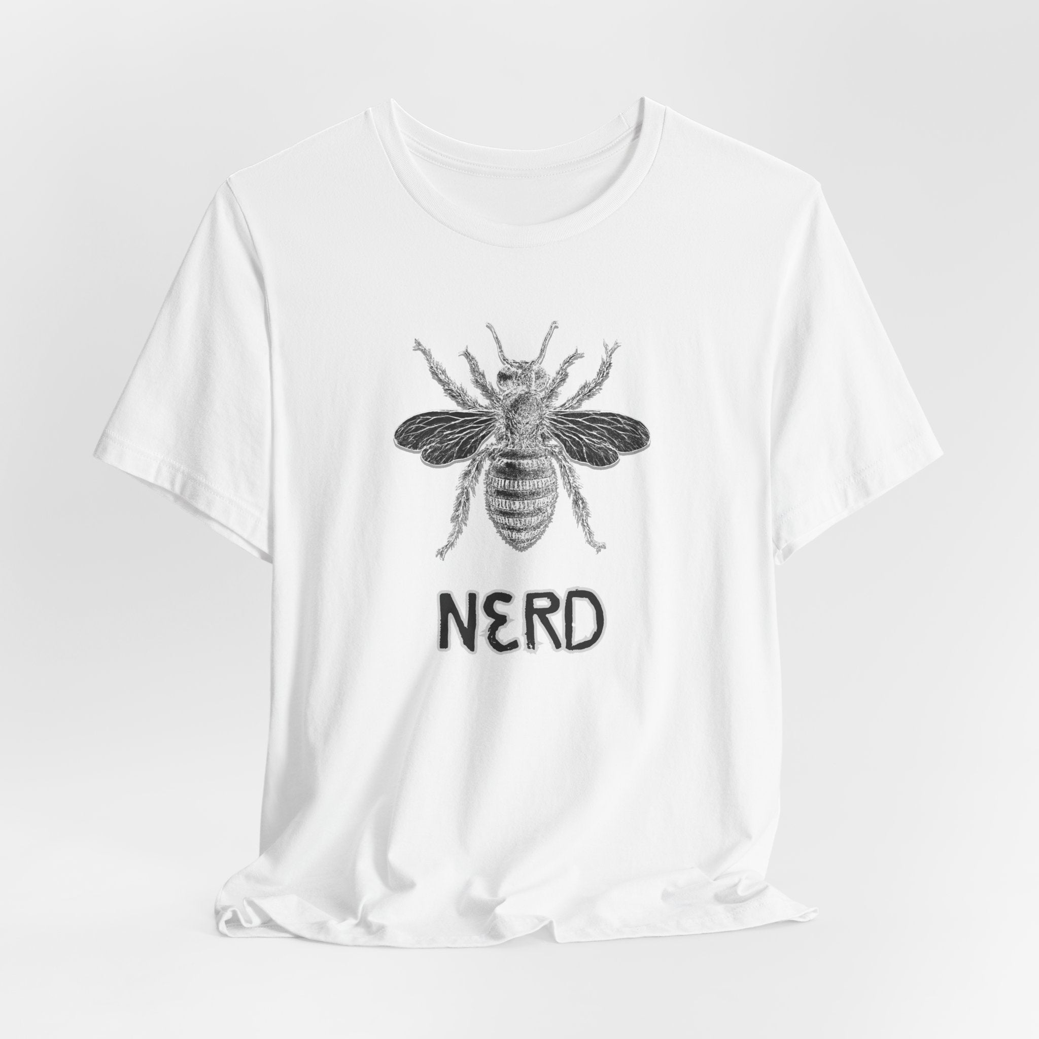 White t-shirt with bee graphic and "NERD" text print on a white background