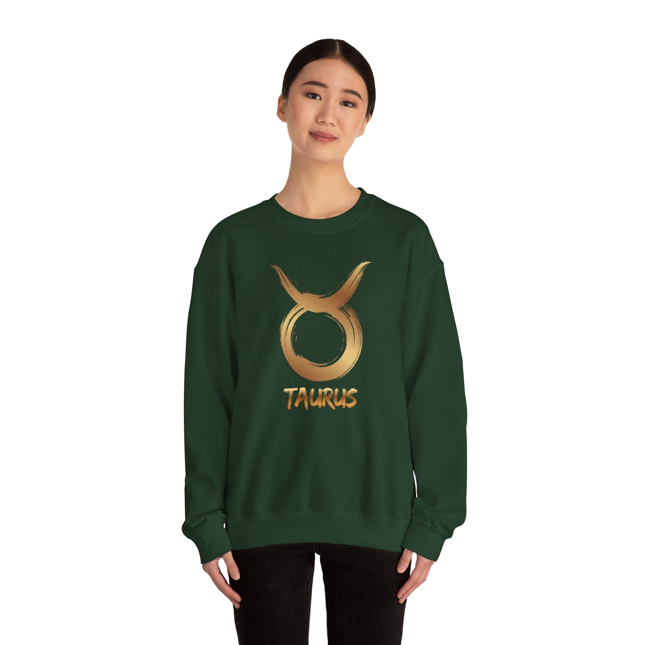 Person wearing a green sweatshirt with Taurus symbol and text on a white background
