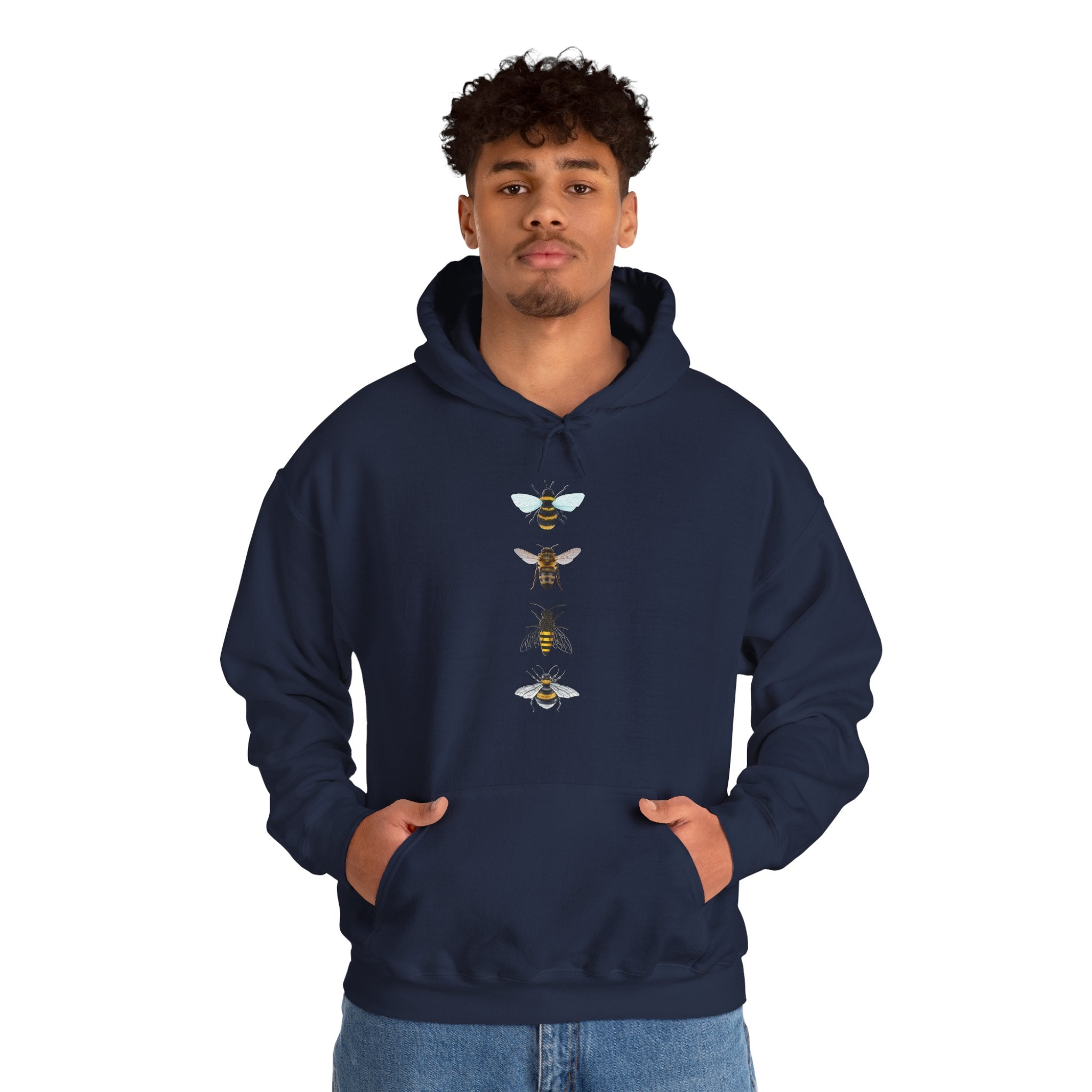 Person wearing a navy hoodie with bee graphic on a white background