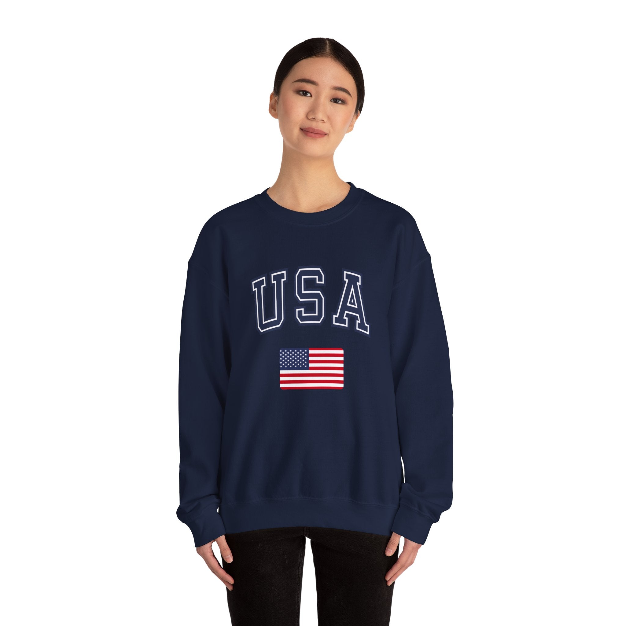 Person wearing a navy blue sweatshirt with 'USA' and American flag on a white background