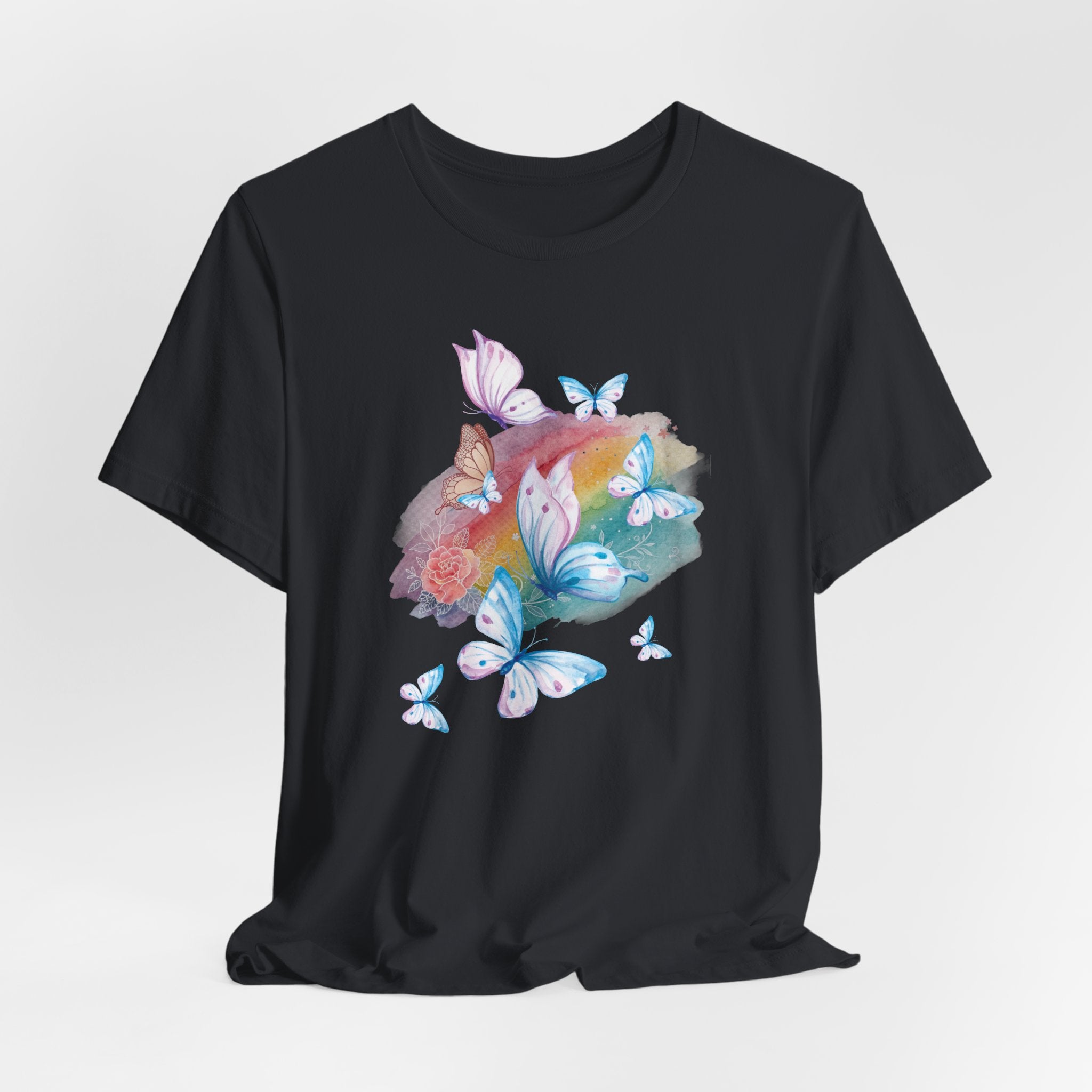 Black t-shirt with colorful butterfly and flower design on a white background