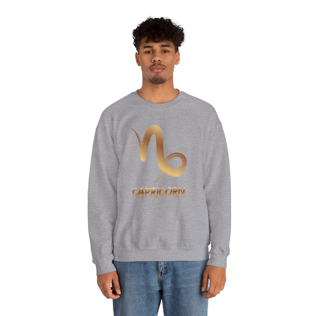 Person wearing a gray sweatshirt with Capricorn symbol and text on a white background