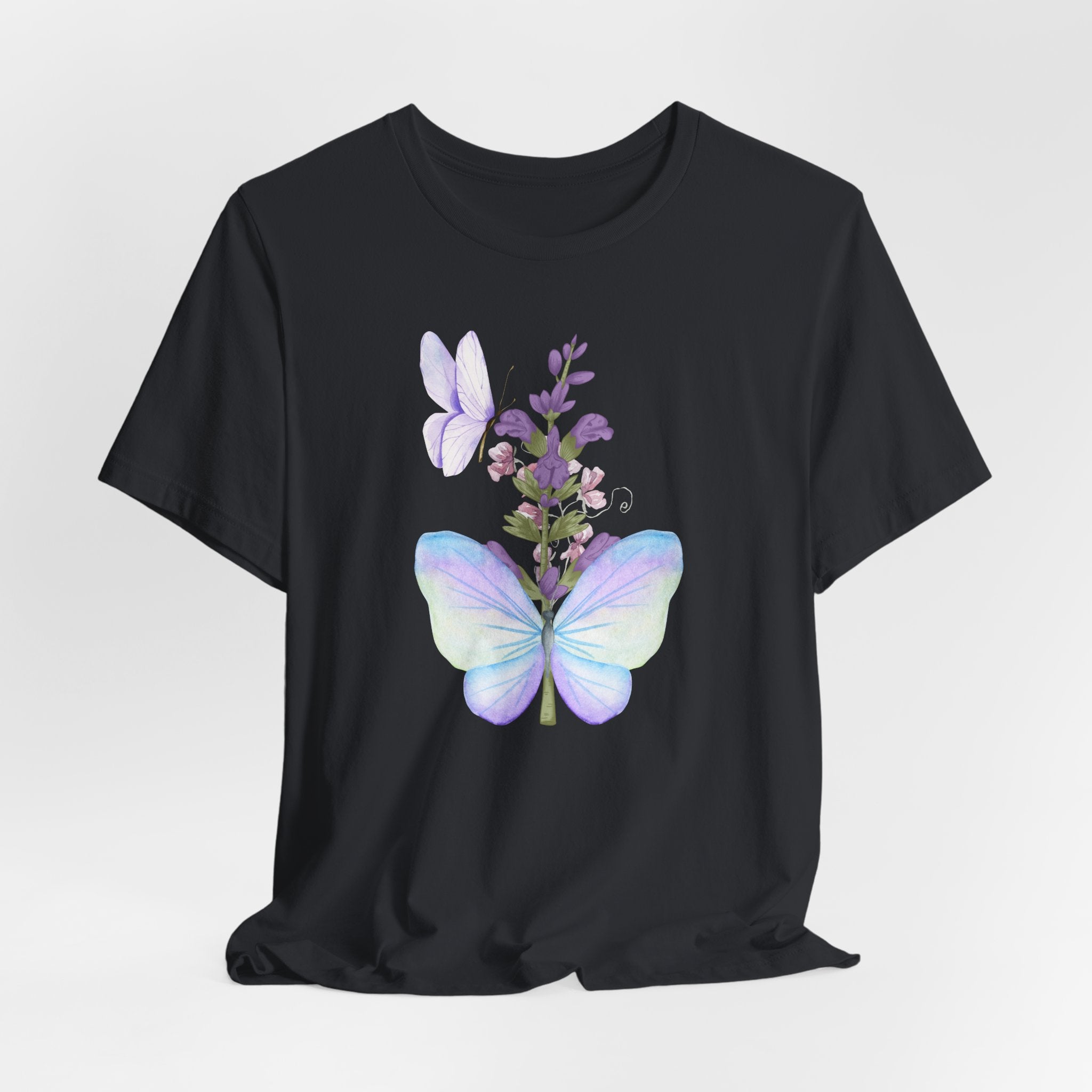 Black t-shirt with butterfly and floral design on a white background