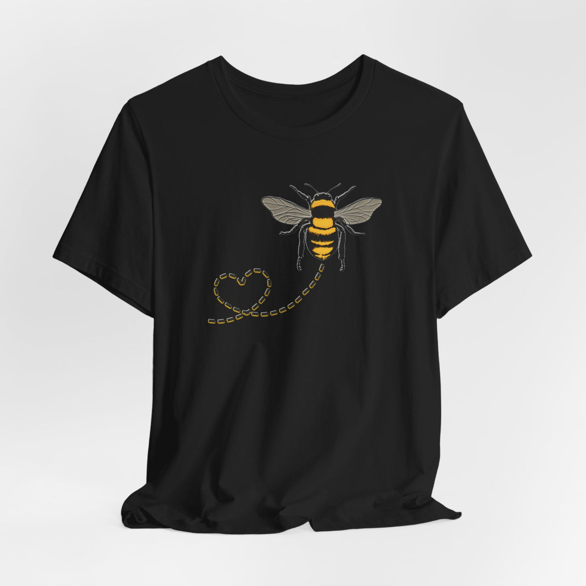 Black t-shirt with a bee and heart design on a white background