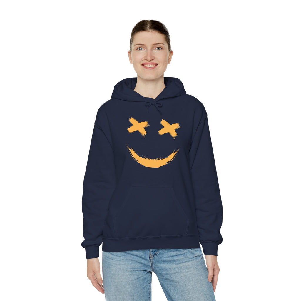 Person wearing a navy blue hoodie with colorful design and text on a white background