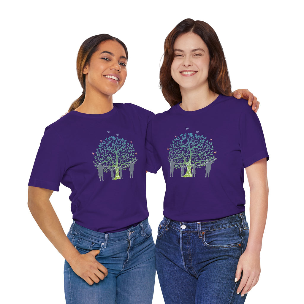Two women wearing purple t-shirts with a tree design on a white background