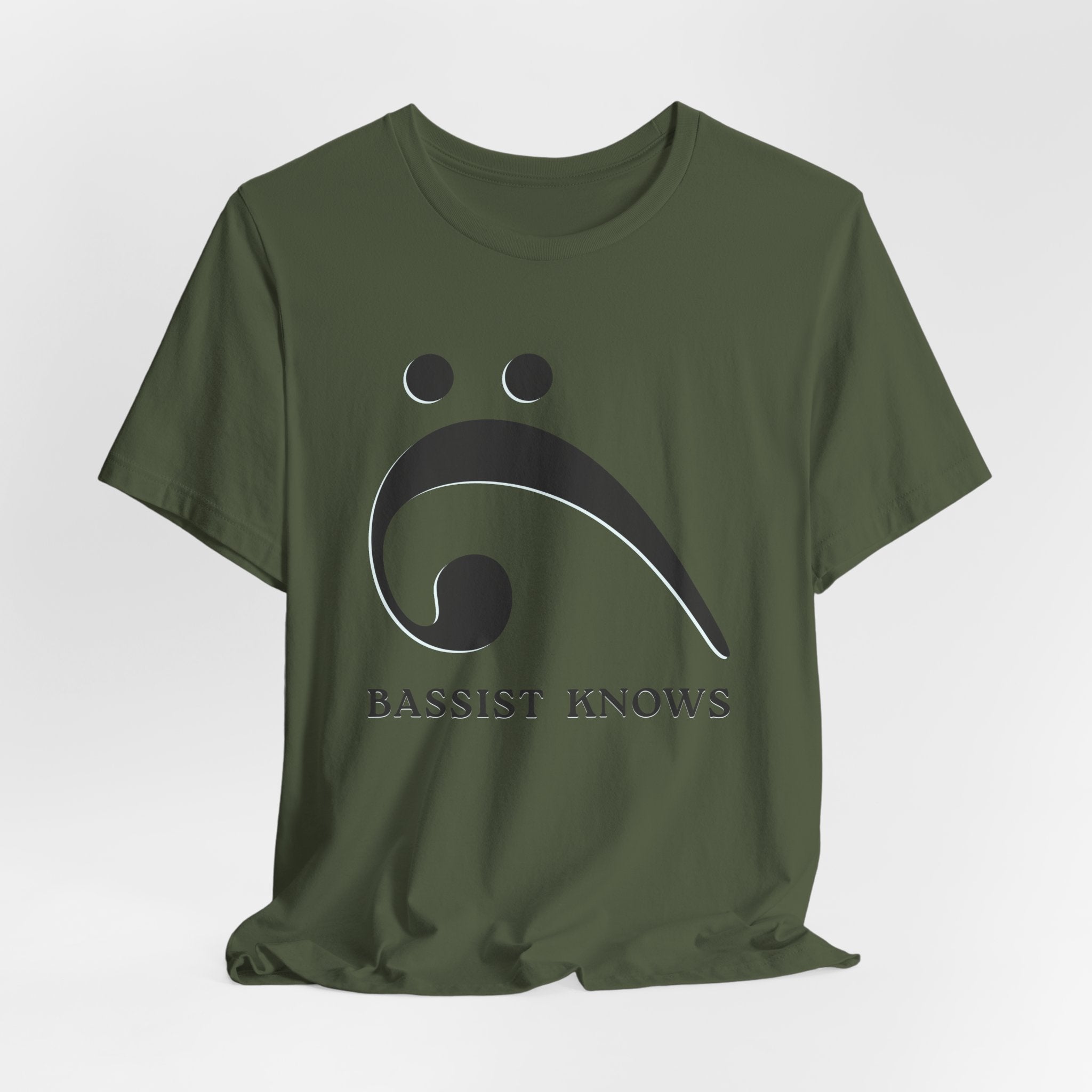 Green t-shirt with black bass clef and 'Bassist Knows' text on a light gray background
