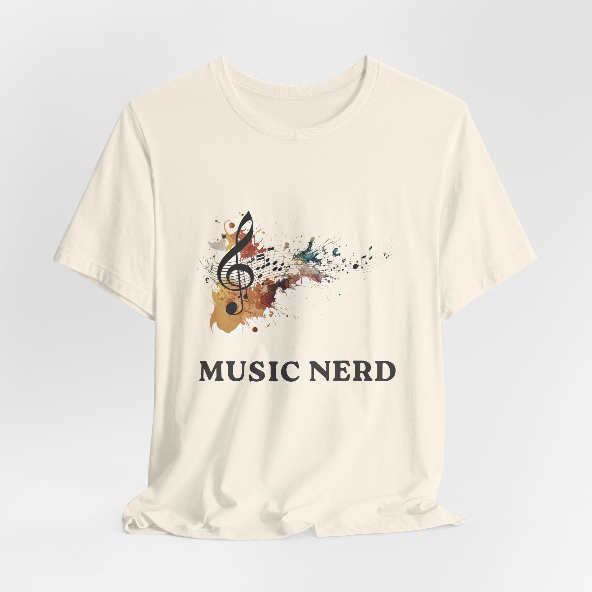 Beige t-shirt with 'Music Nerd' graphic design on a light gray background