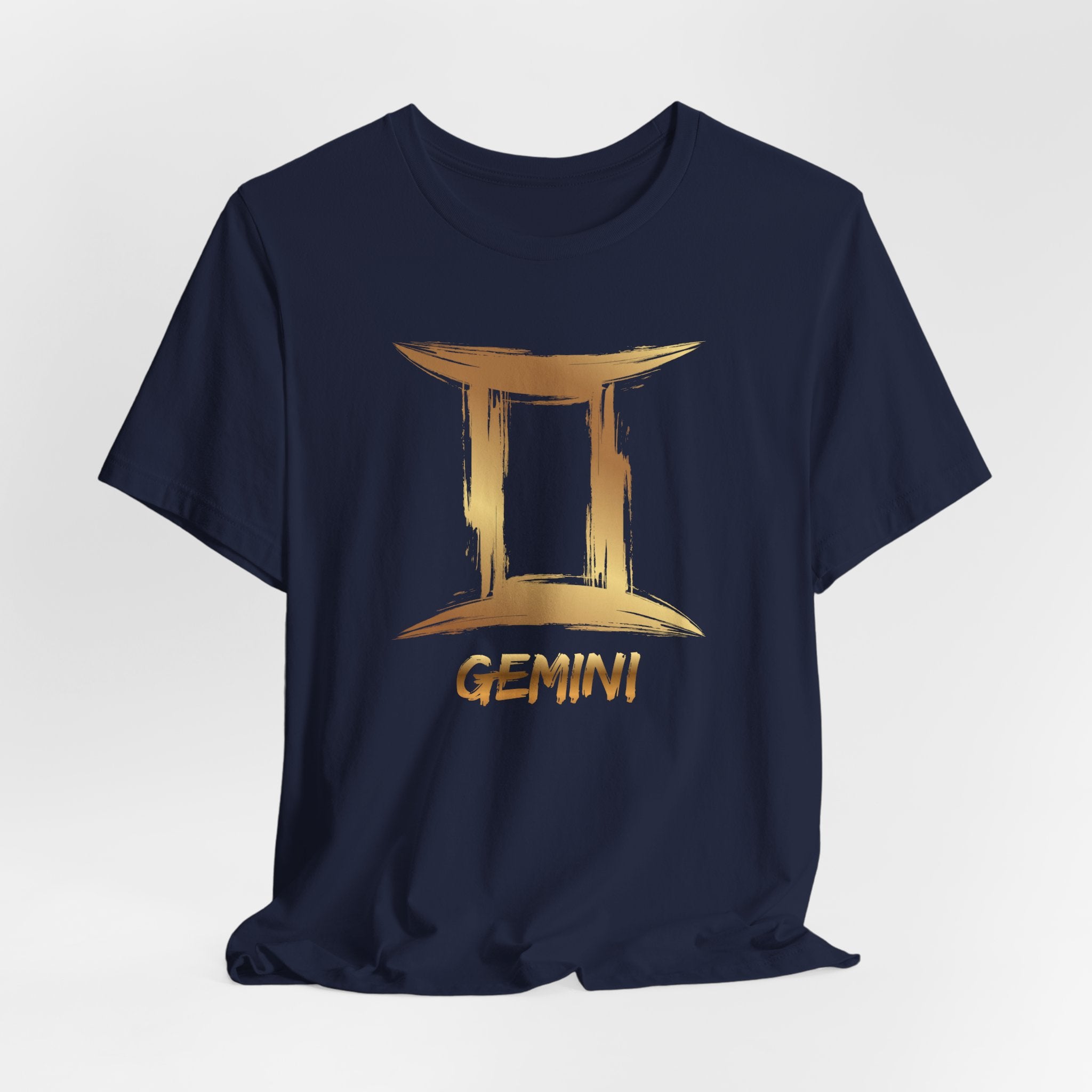 Navy blue t-shirt with gold Gemini zodiac sign design on a white background