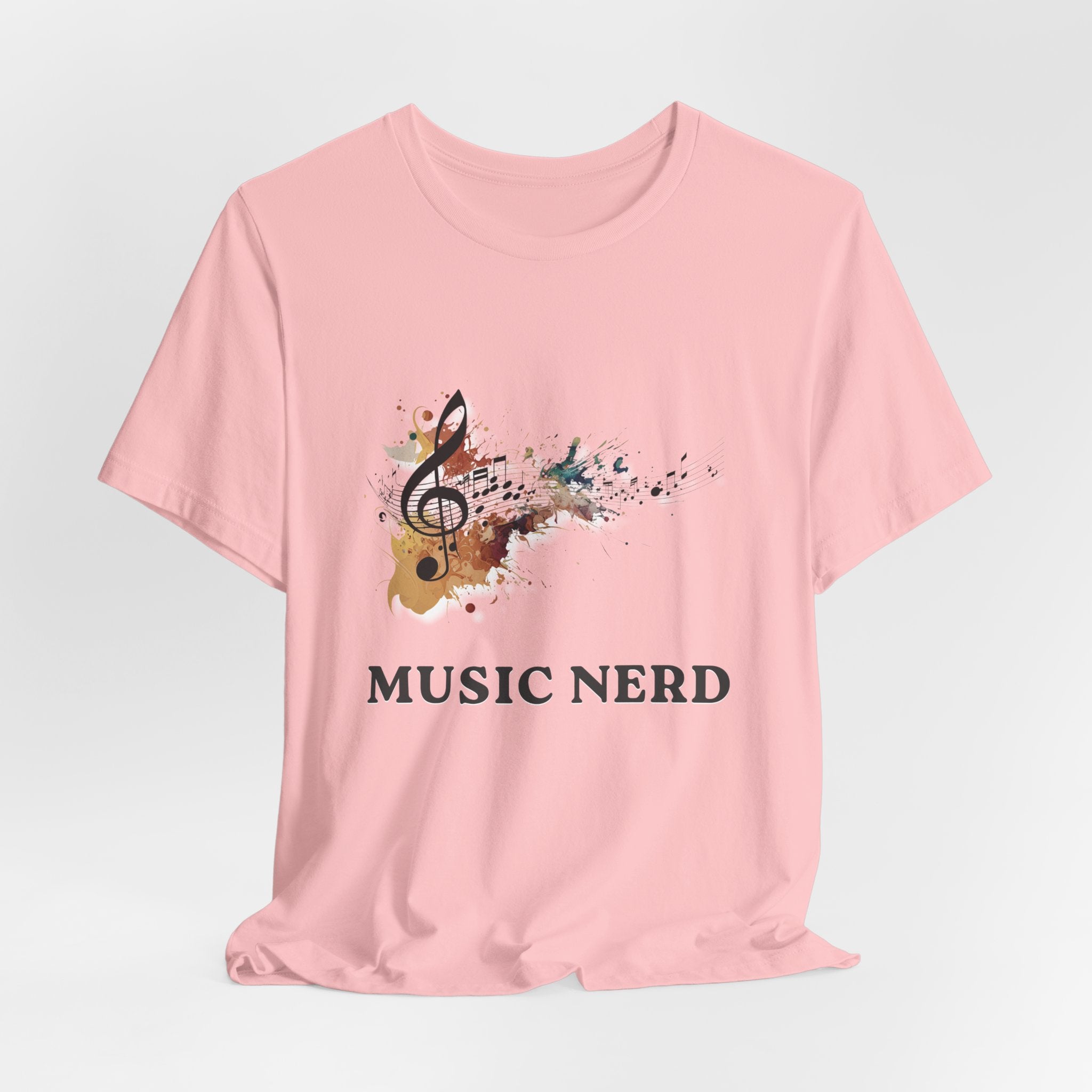 Pink t-shirt with a graphic of a guitar and treble clef, and 'MUSIC NERD' text on a light gray background.