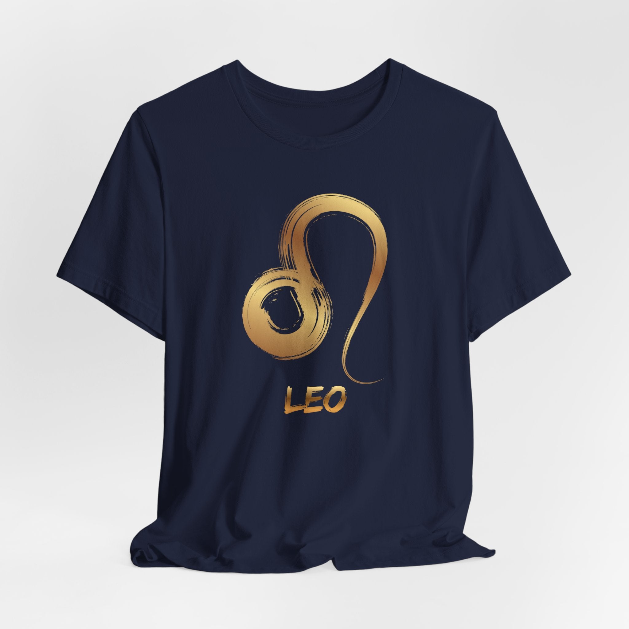 Navy blue t-shirt with gold Leo zodiac symbol on a white background