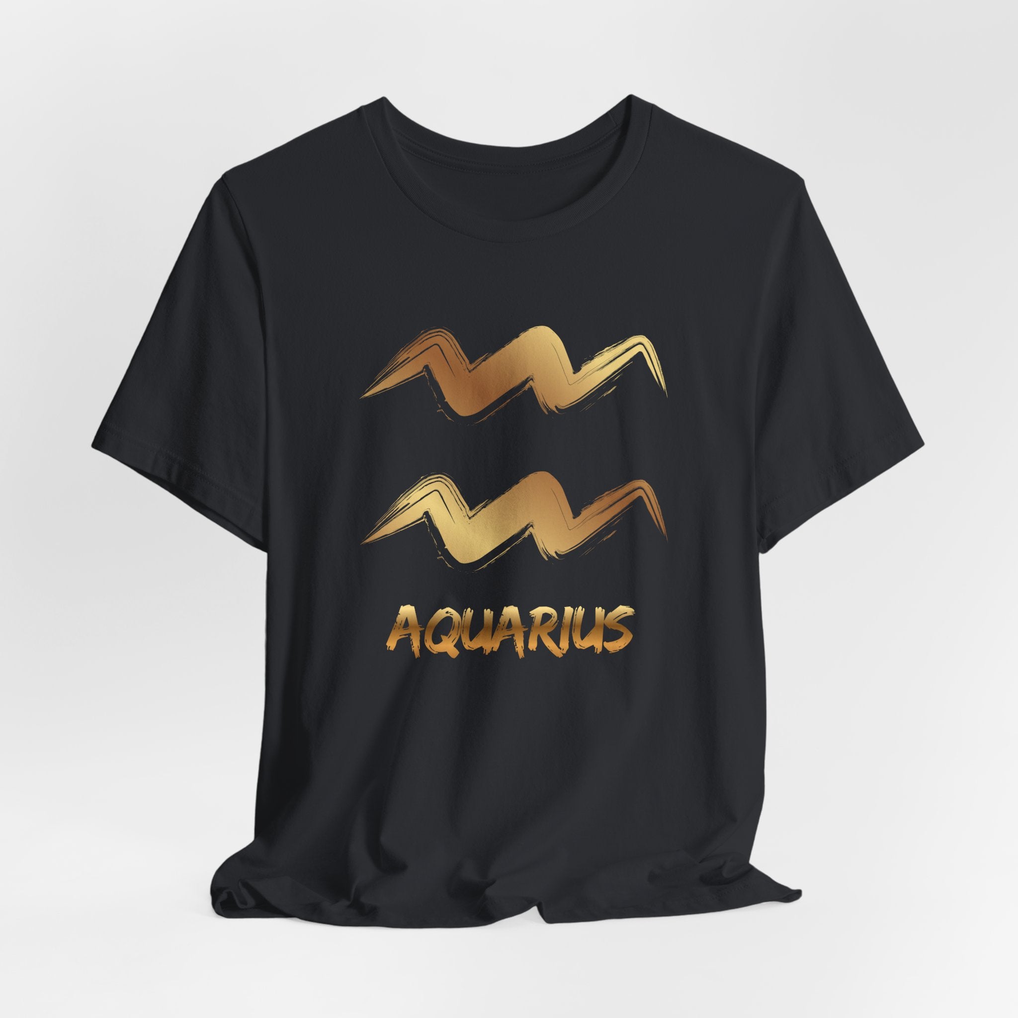 Black t-shirt with gold Aquarius zodiac symbol on a white background