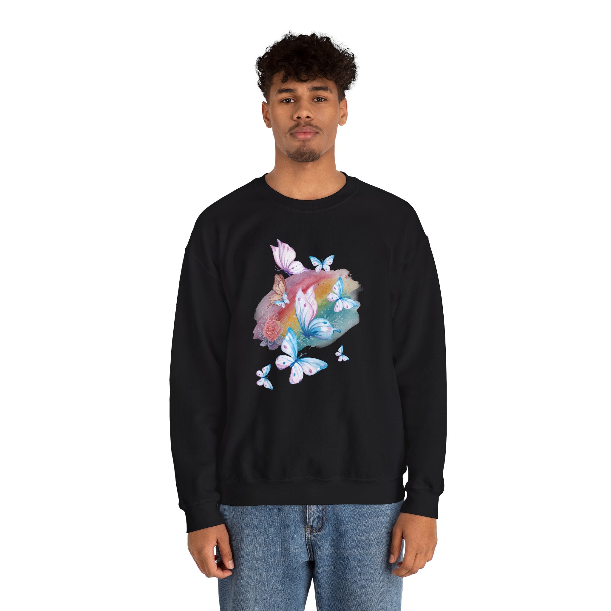Person wearing a black sweatshirt with colorful butterfly design on a white background