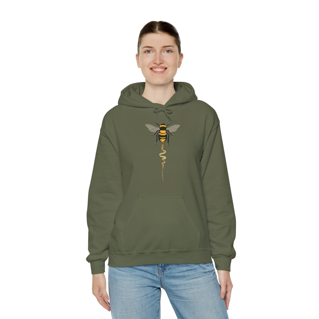 Person wearing a green hoodie with a bee design on a white background