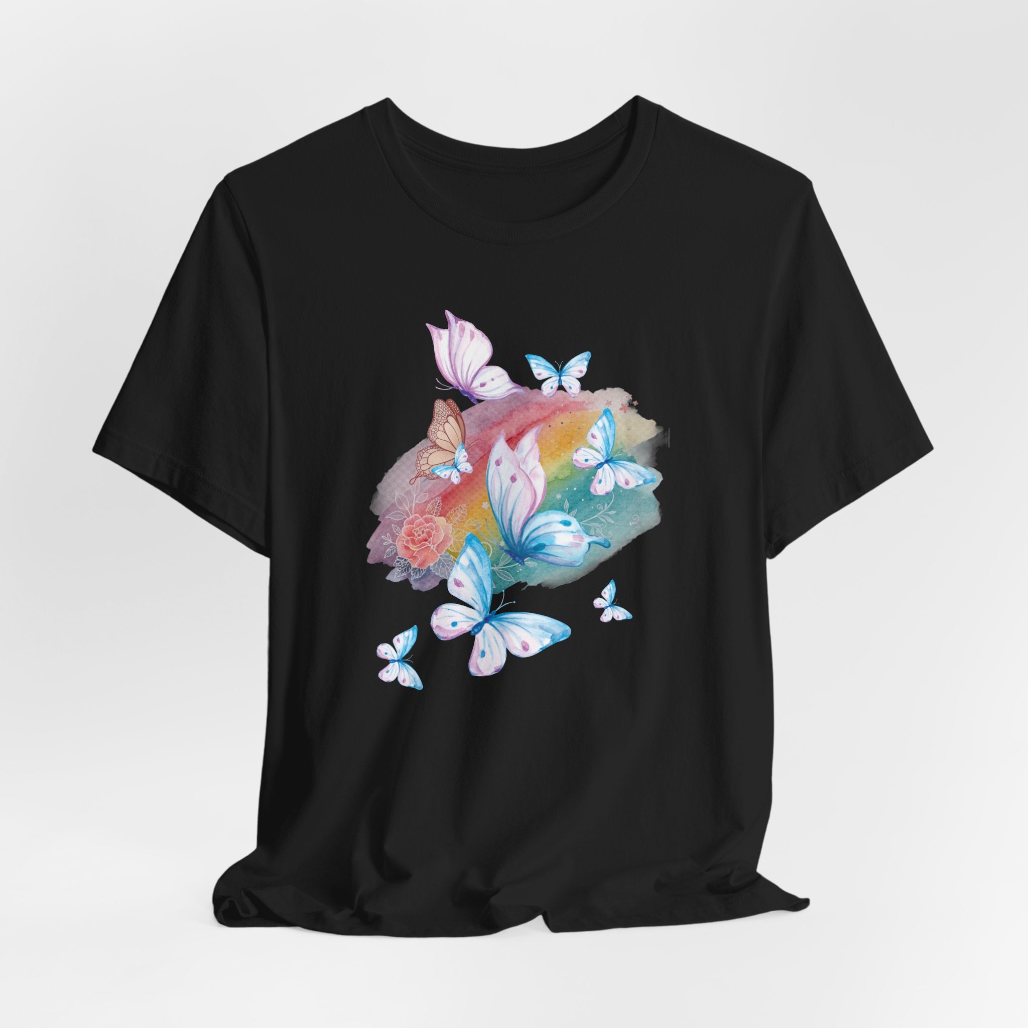 Black t-shirt with colorful butterfly and flower design on a white background