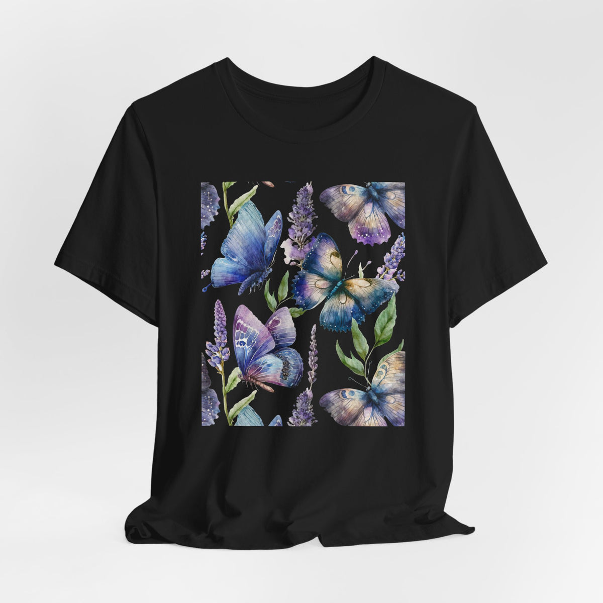 Black t-shirt with colorful butterfly design on a white background