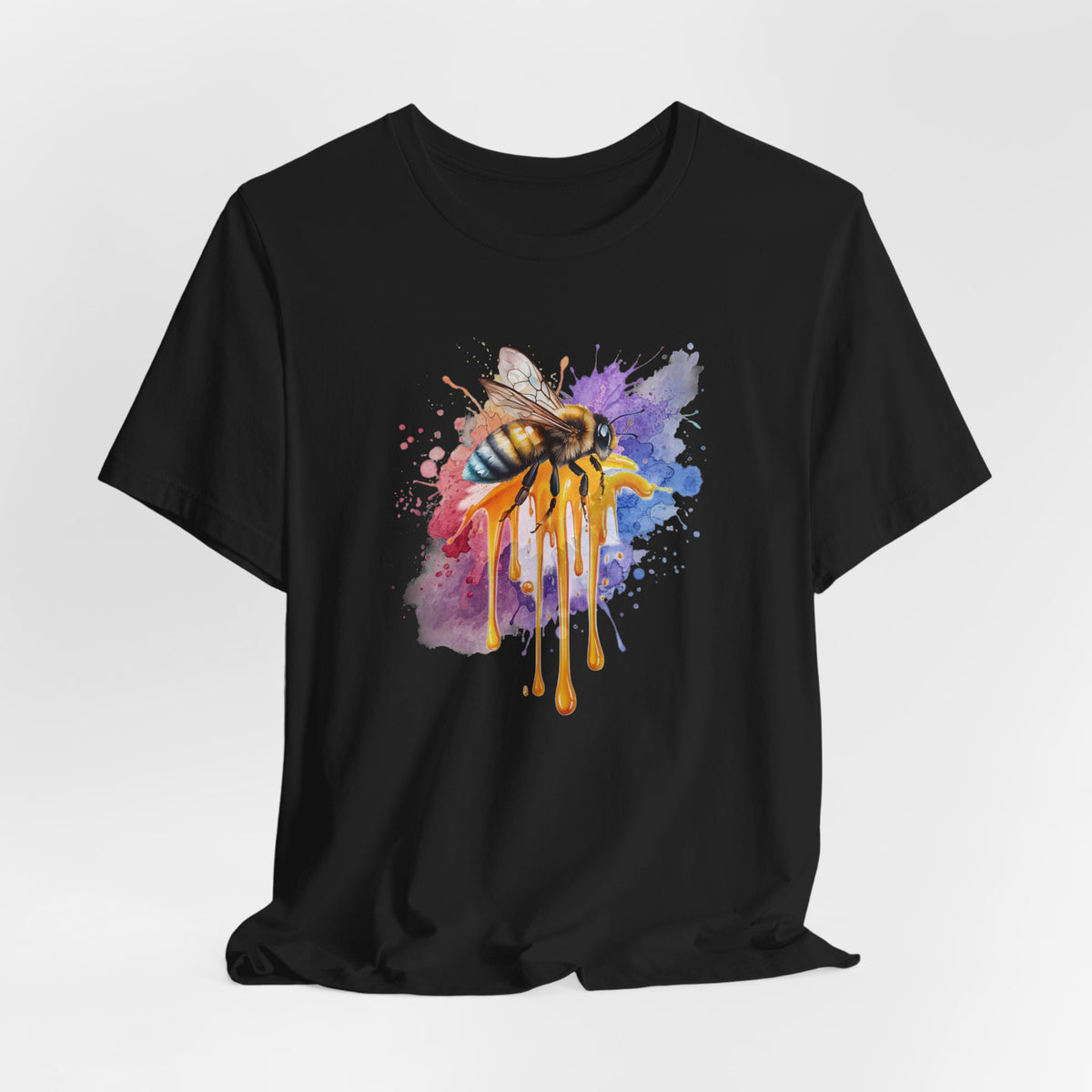 Black t-shirt with a colorful bee design on a white background