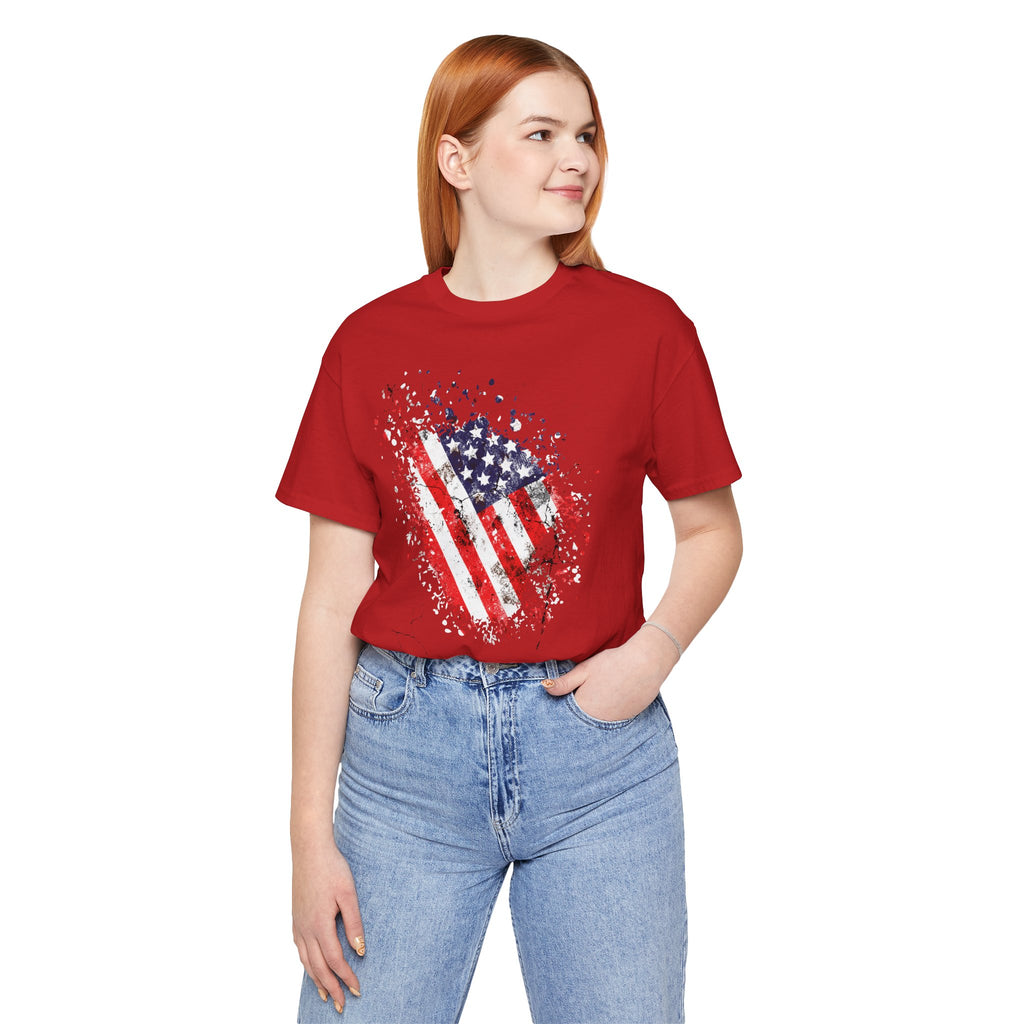 Person wearing a red t-shirt with an American flag design on a white background
