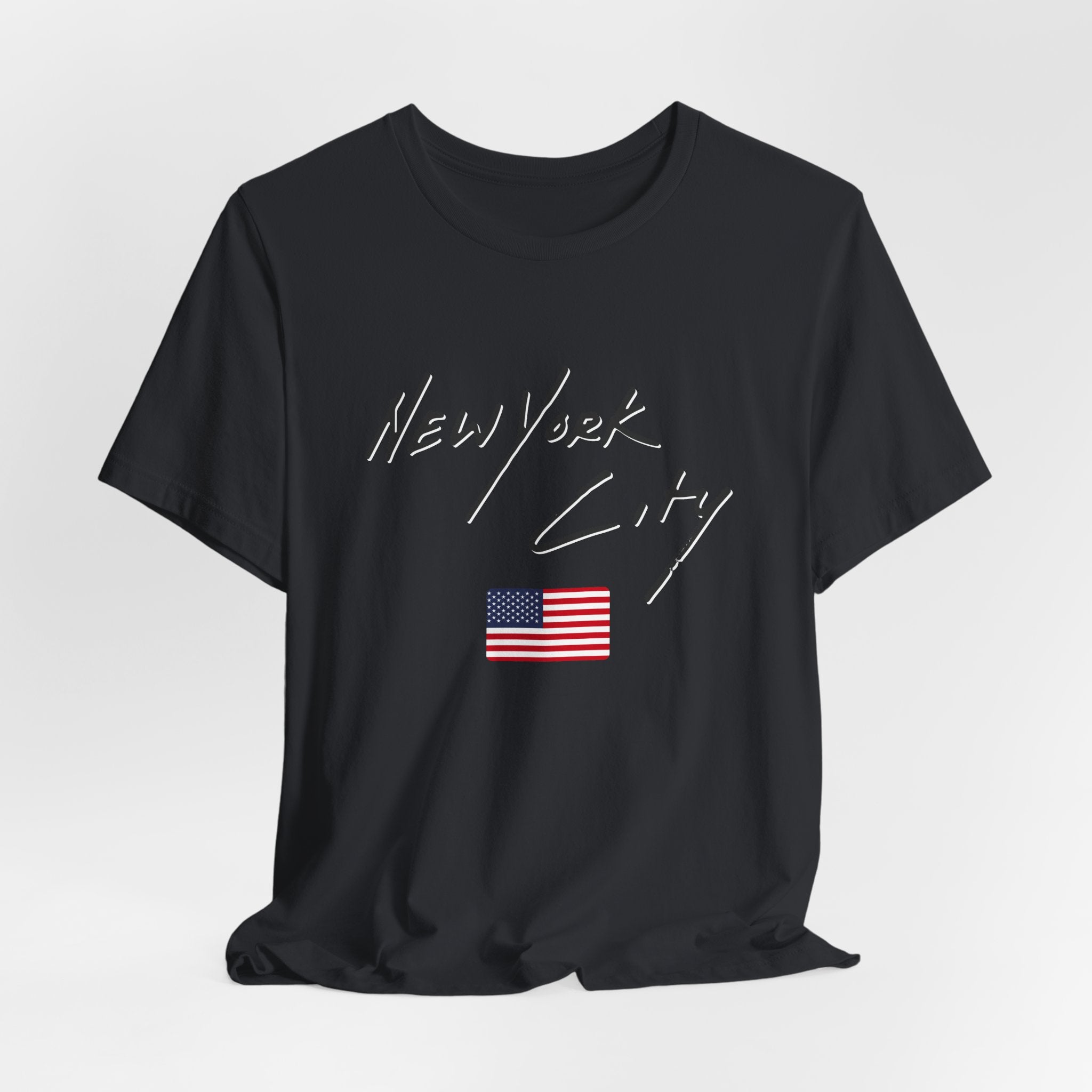 Black t-shirt with 'New York City' text and American flag on a white background