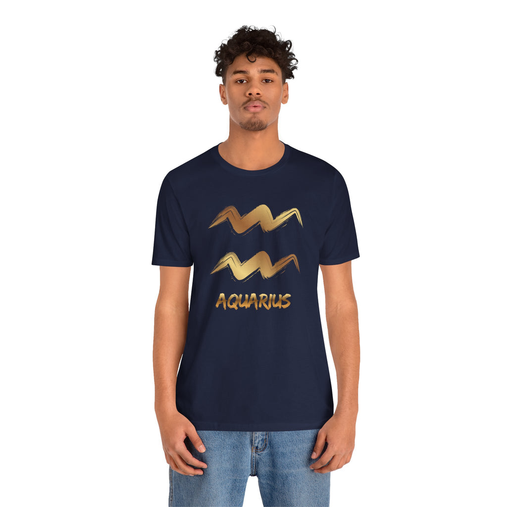 Person wearing a navy blue t-shirt with Aquarius zodiac sign design on a white background