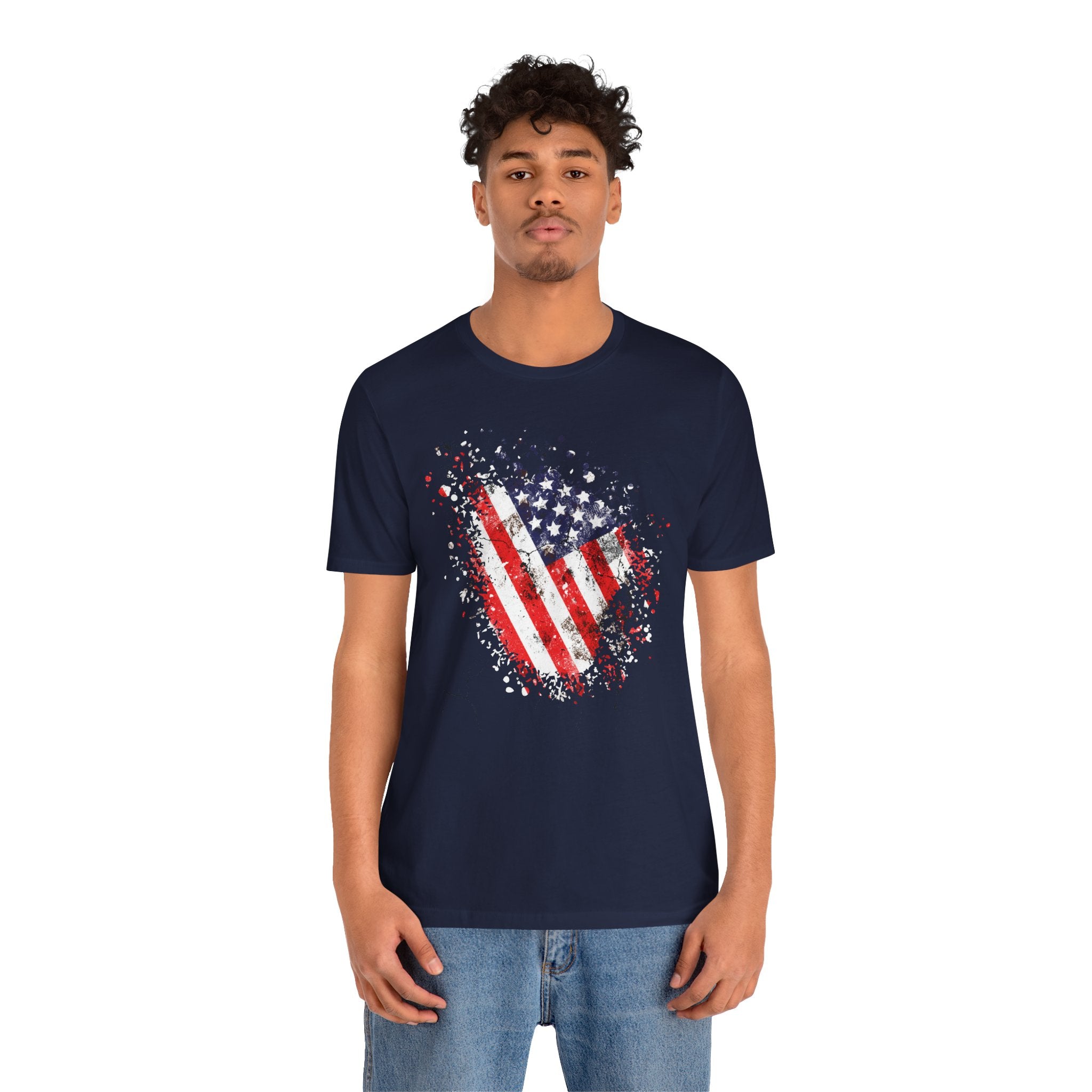 Person wearing a navy blue t-shirt with an American flag design on a white background