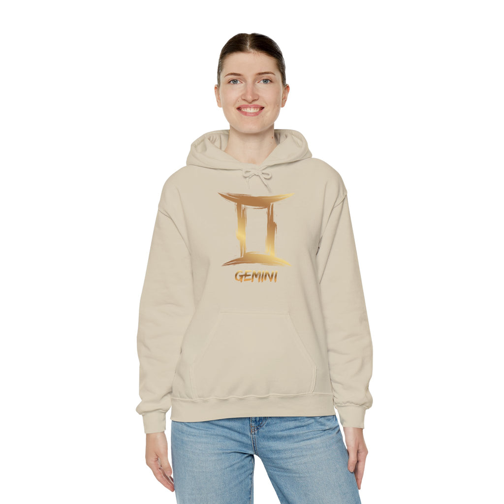 Person wearing a beige hoodie with a gold Gemini logo on a white background