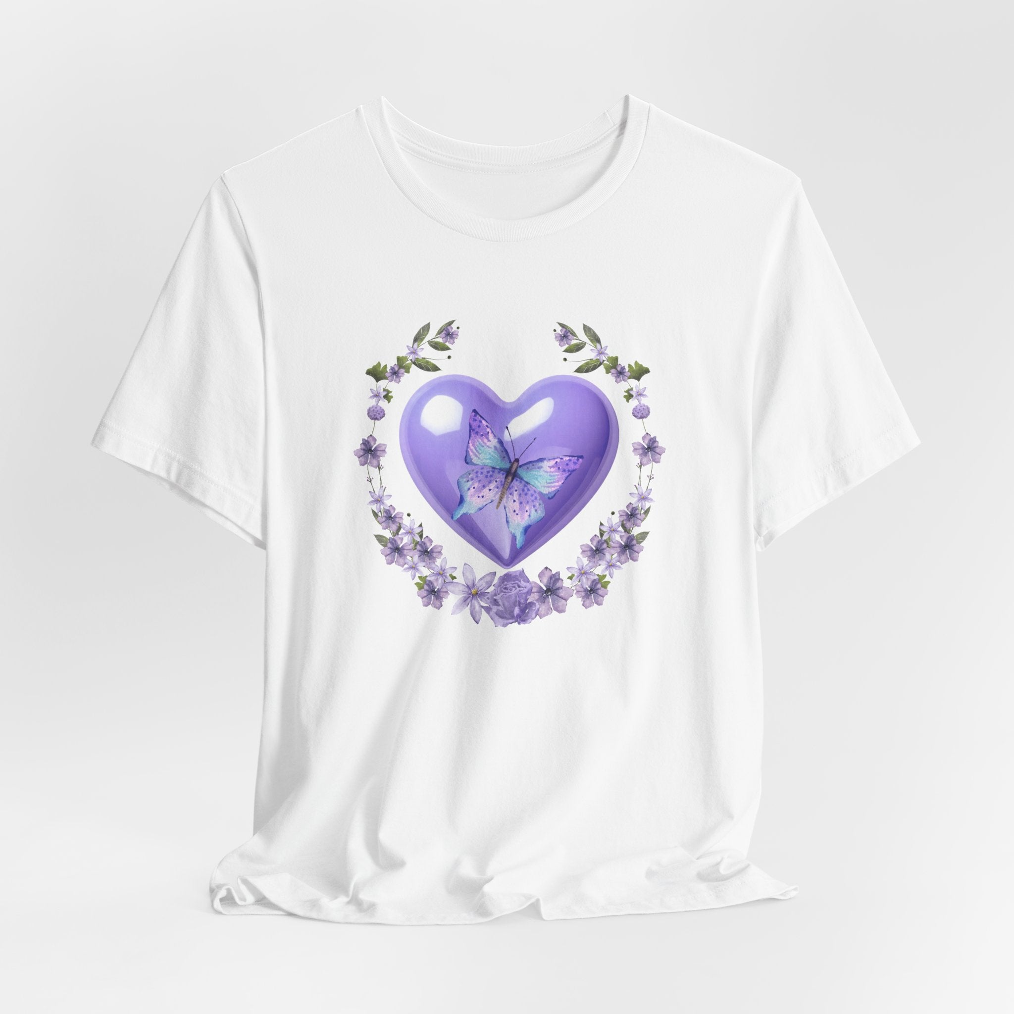 White t-shirt with a purple heart and butterfly design on a white background
