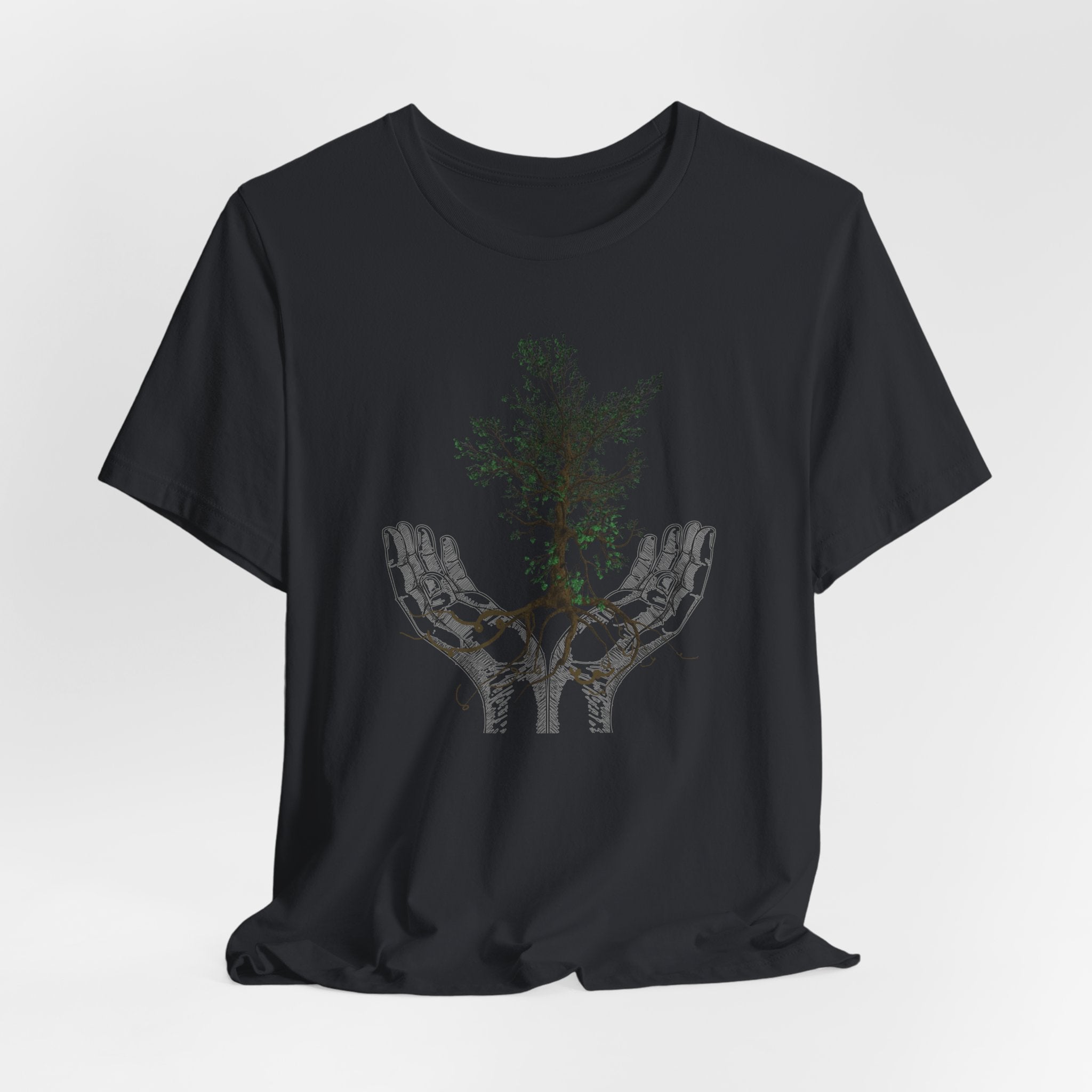 Black t-shirt with a graphic design of hands holding a tree on a white background