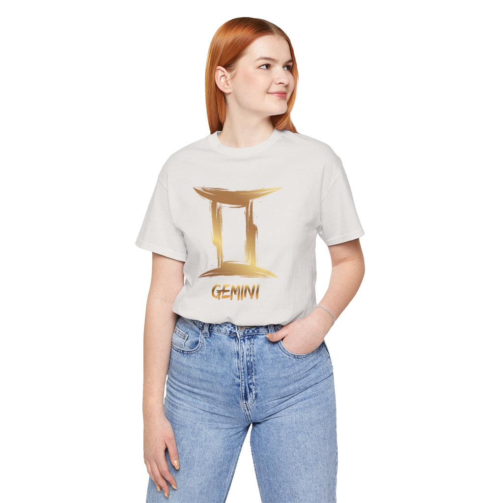 Person wearing a white t-shirt with 'Gemini' design on a white background