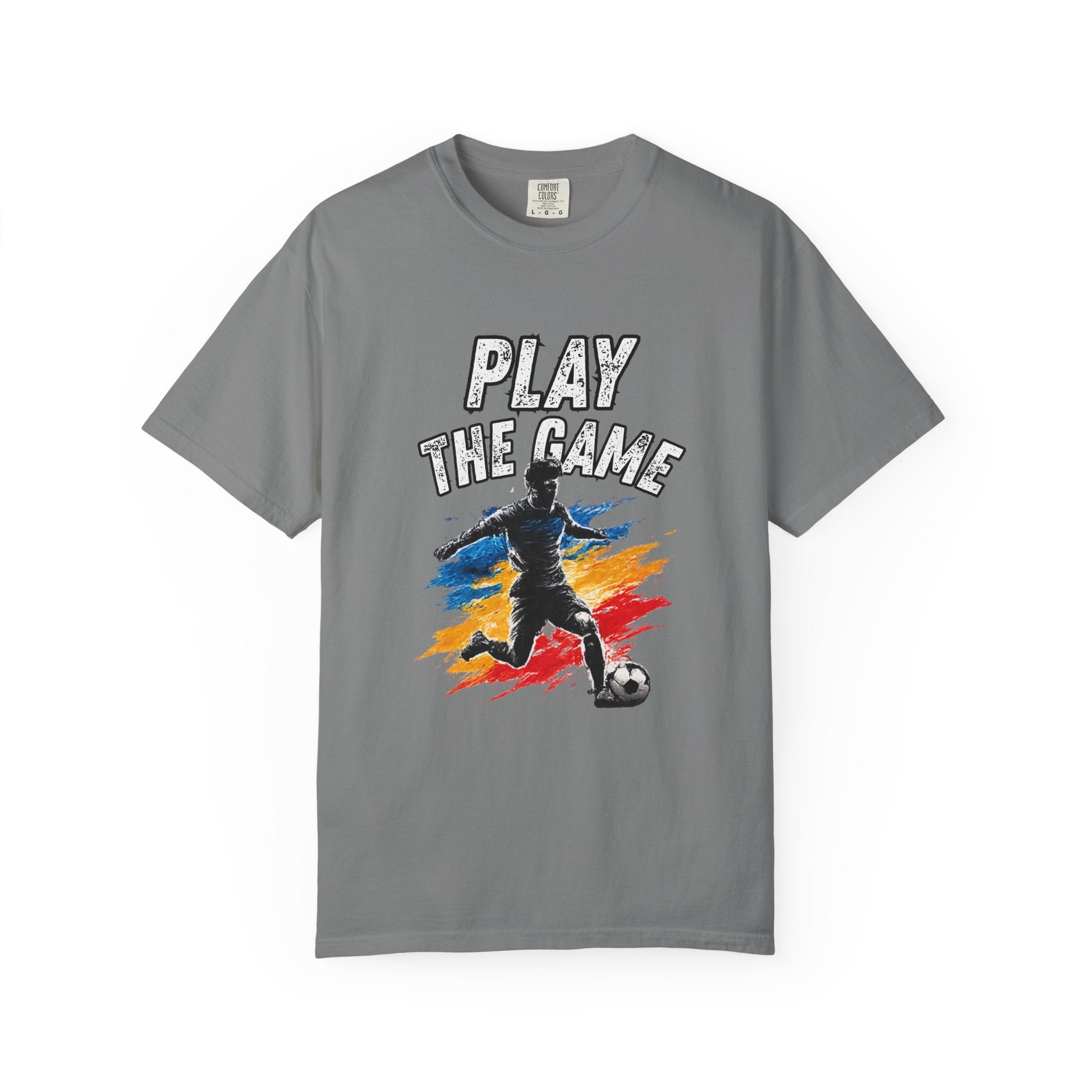 A gray short-sleeve crewneck t-shirt featuring a graphic of a soccer player kicking a ball with the text 'PLAY THE GAME' above, set against a plain white background.