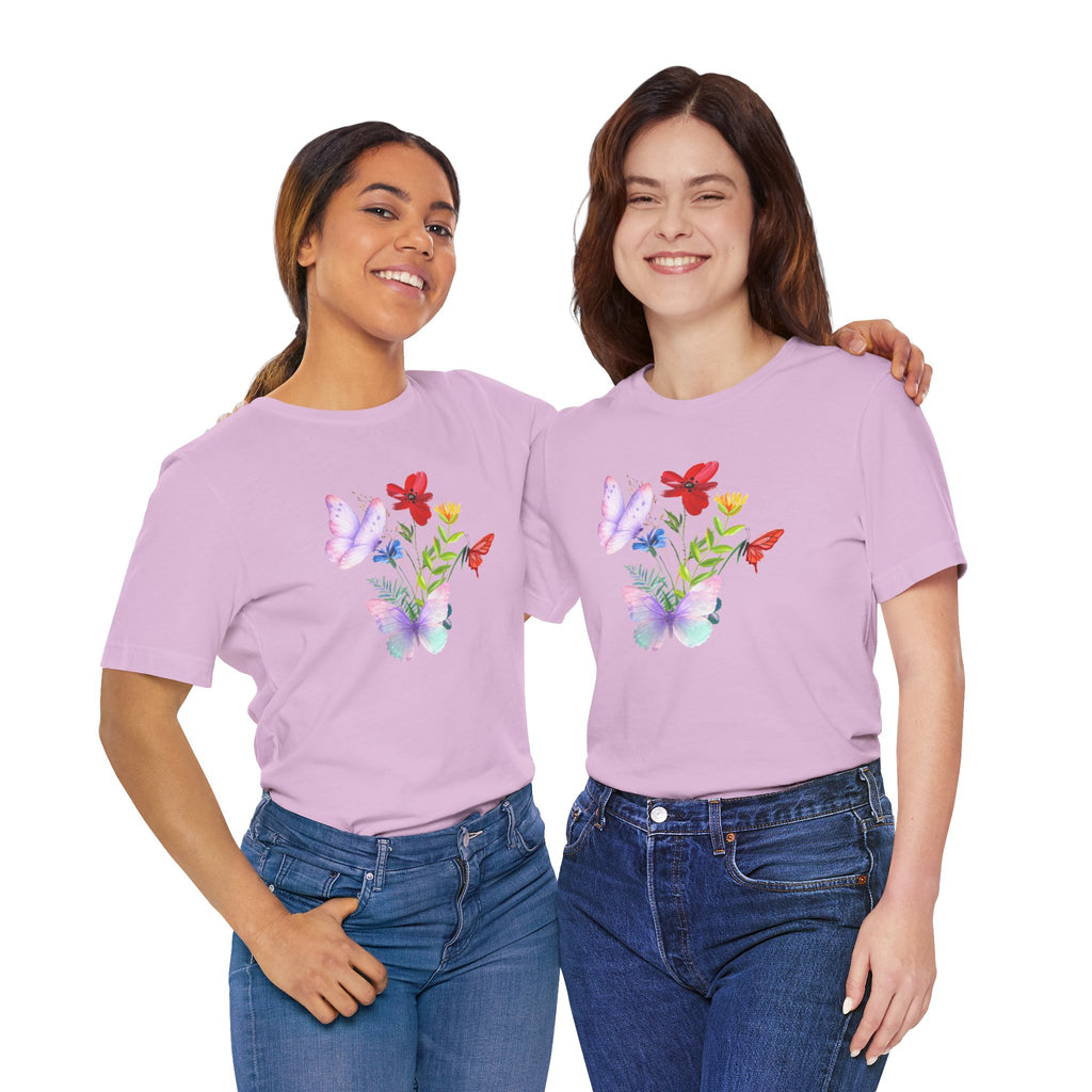 Two women wearing matching purple t-shirts with floral designs on a white background