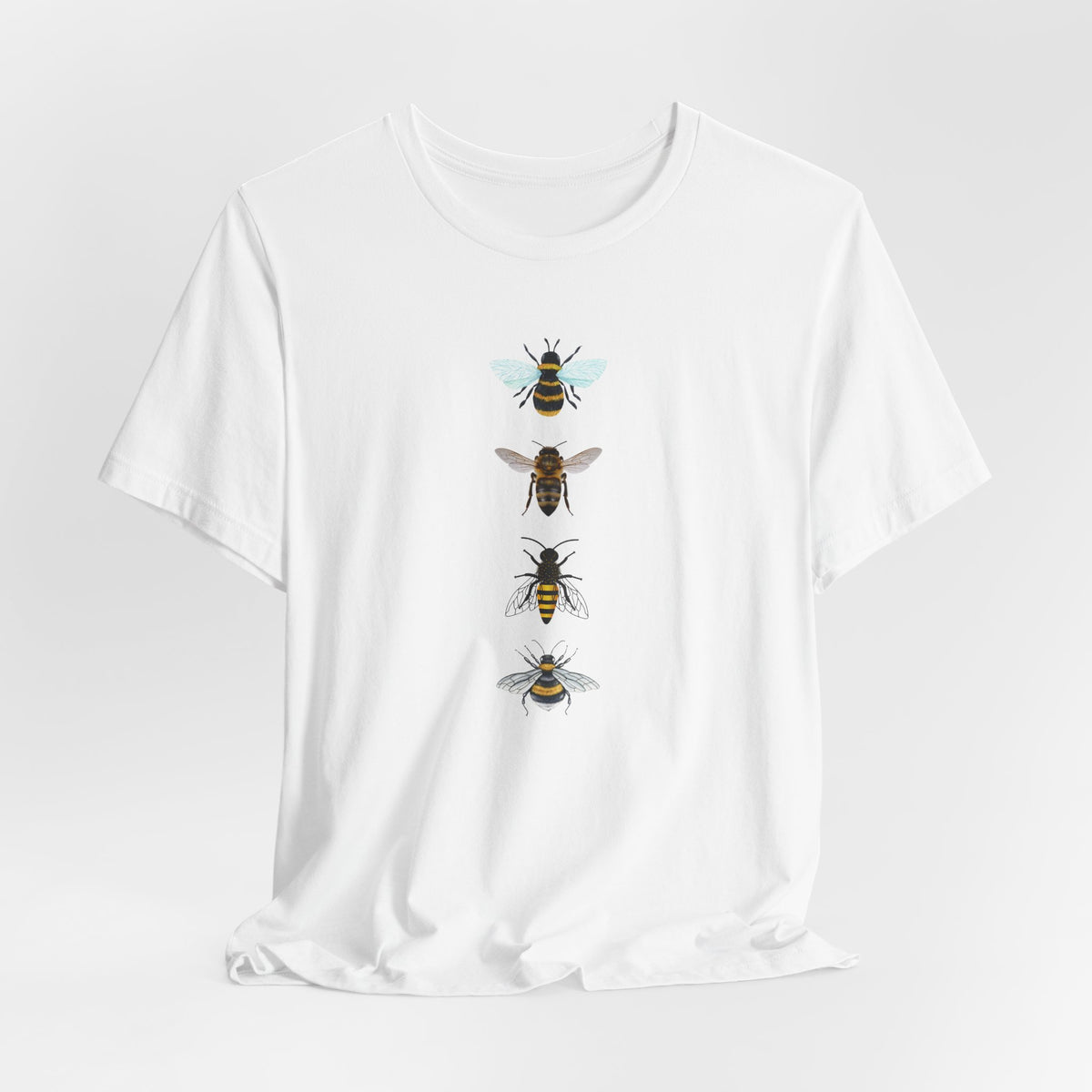 White t-shirt with bee illustrations on a white background