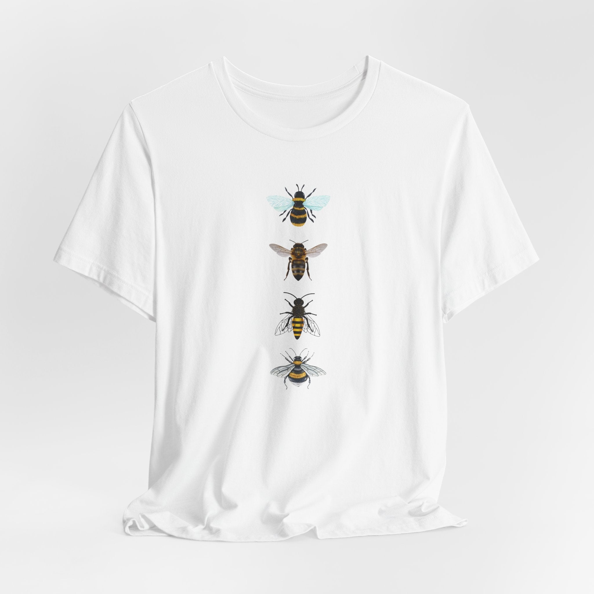 White t-shirt with bee illustrations on a white background