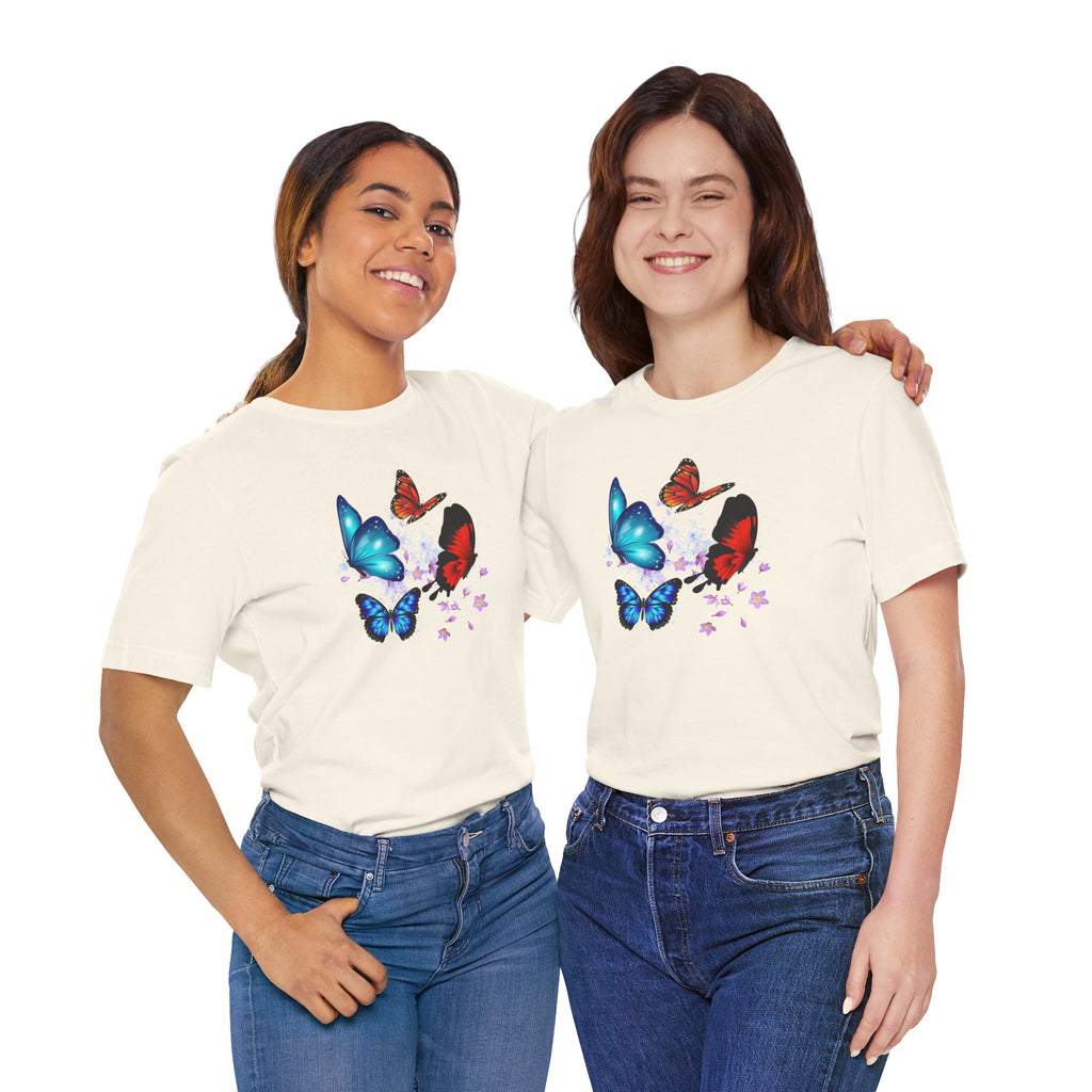 Two women wearing cream t-shirts with butterfly designs on a white background