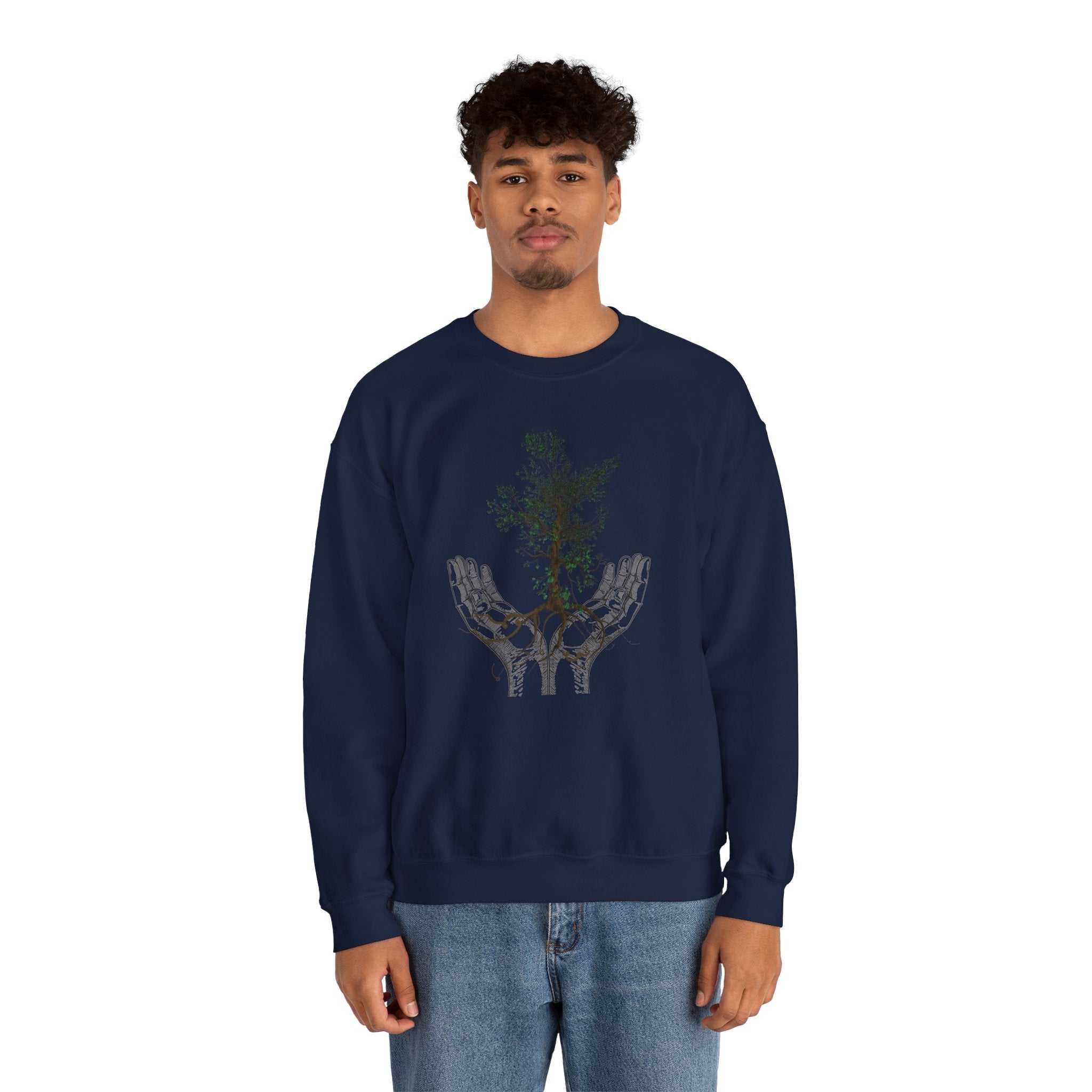 Person wearing a navy blue sweatshirt with a graphic design on a white background