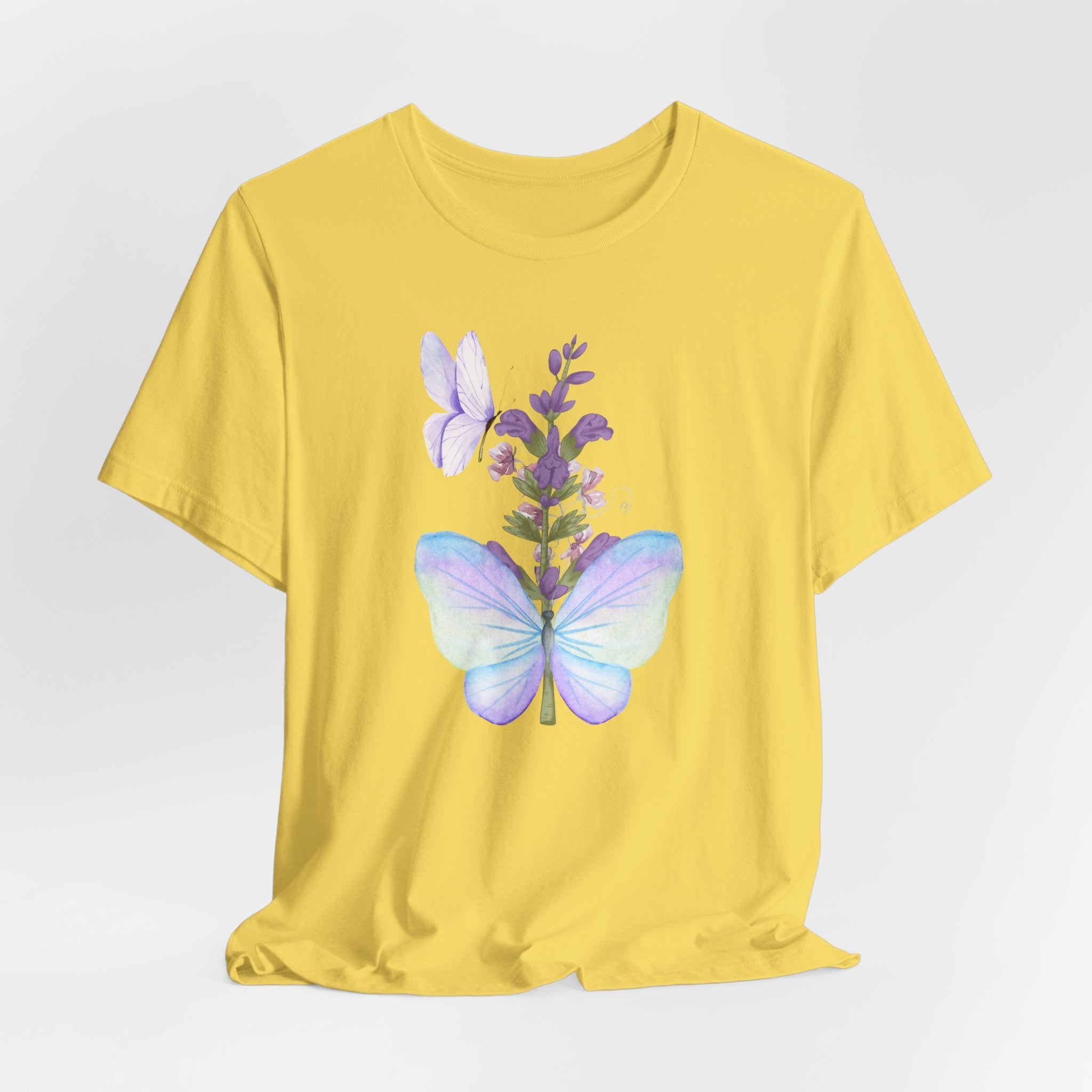 Yellow t-shirt with a butterfly and flower design on a white background