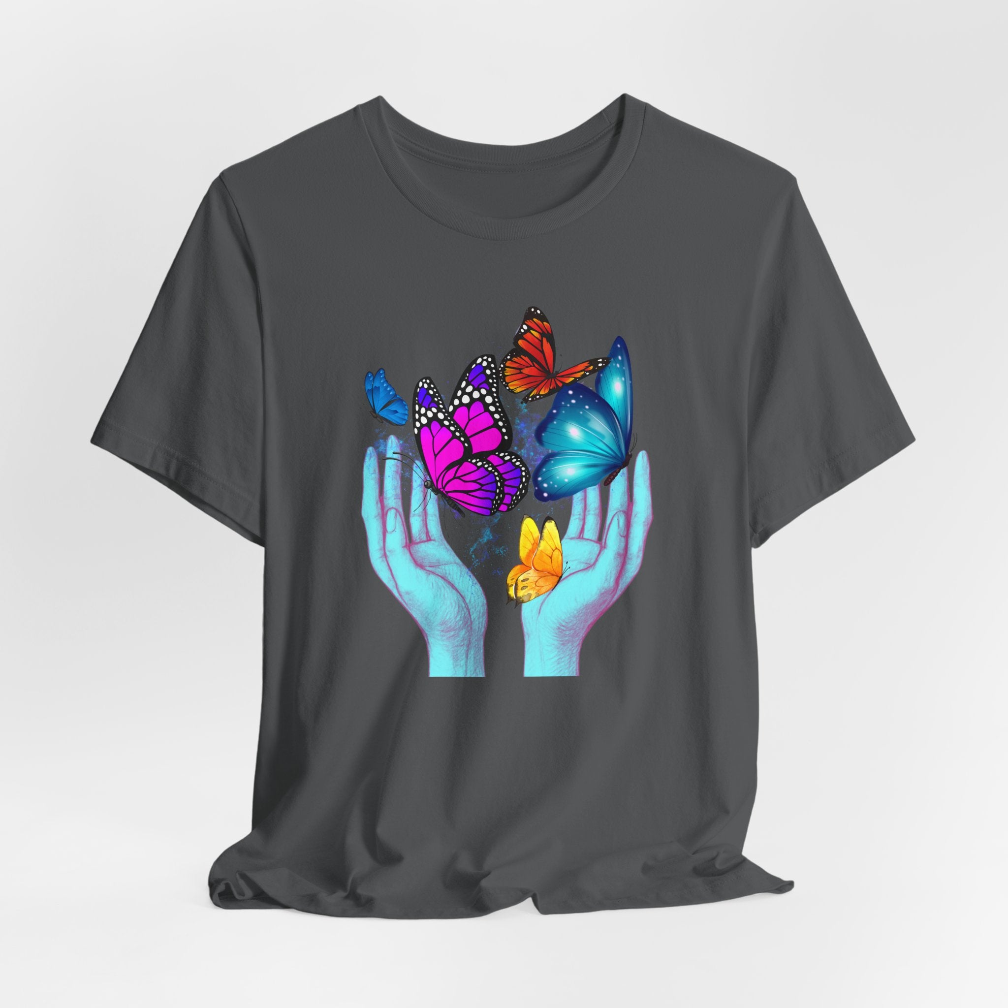 Black t-shirt with colorful butterfly design on a white background