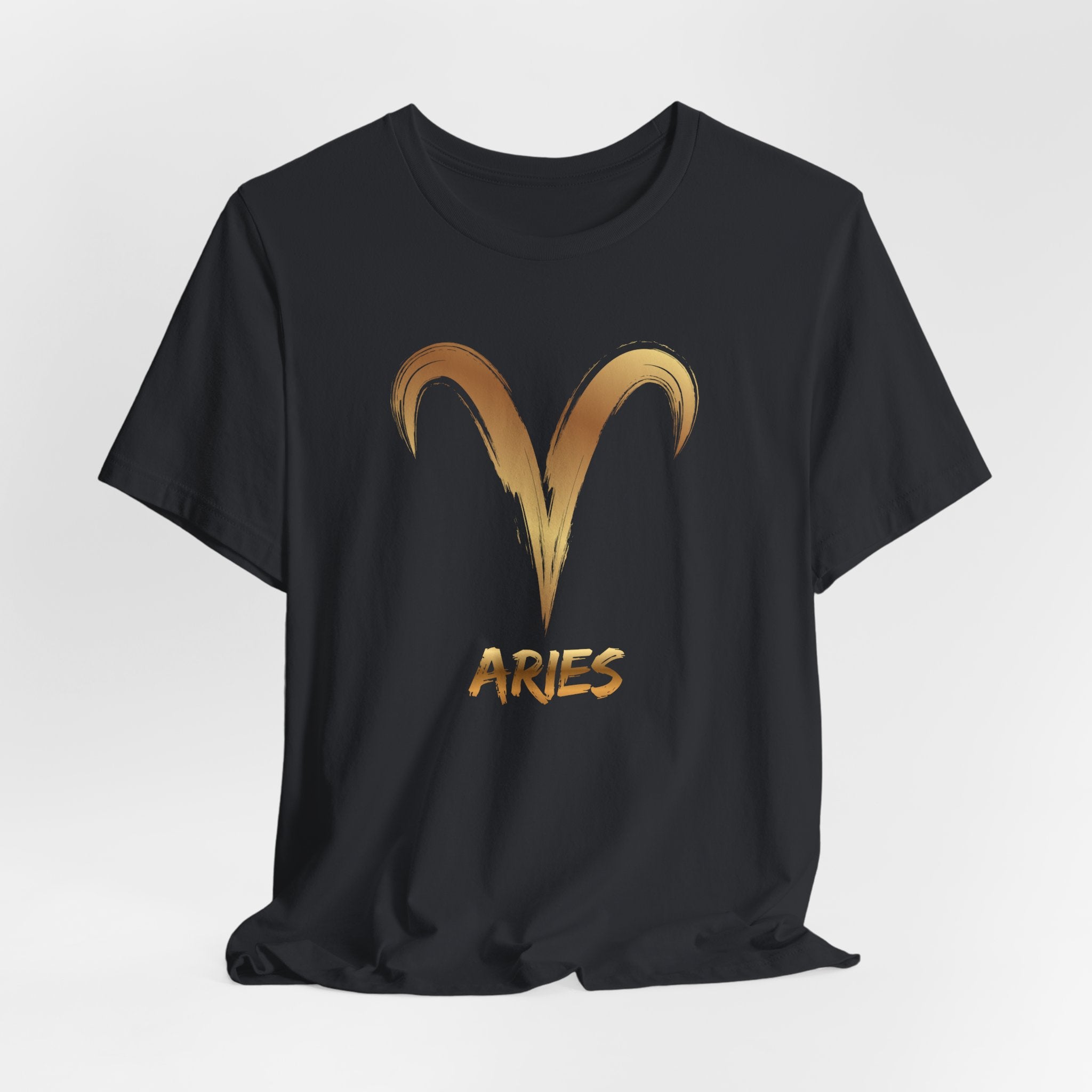 Black t-shirt with gold Aries symbol and text on a white background