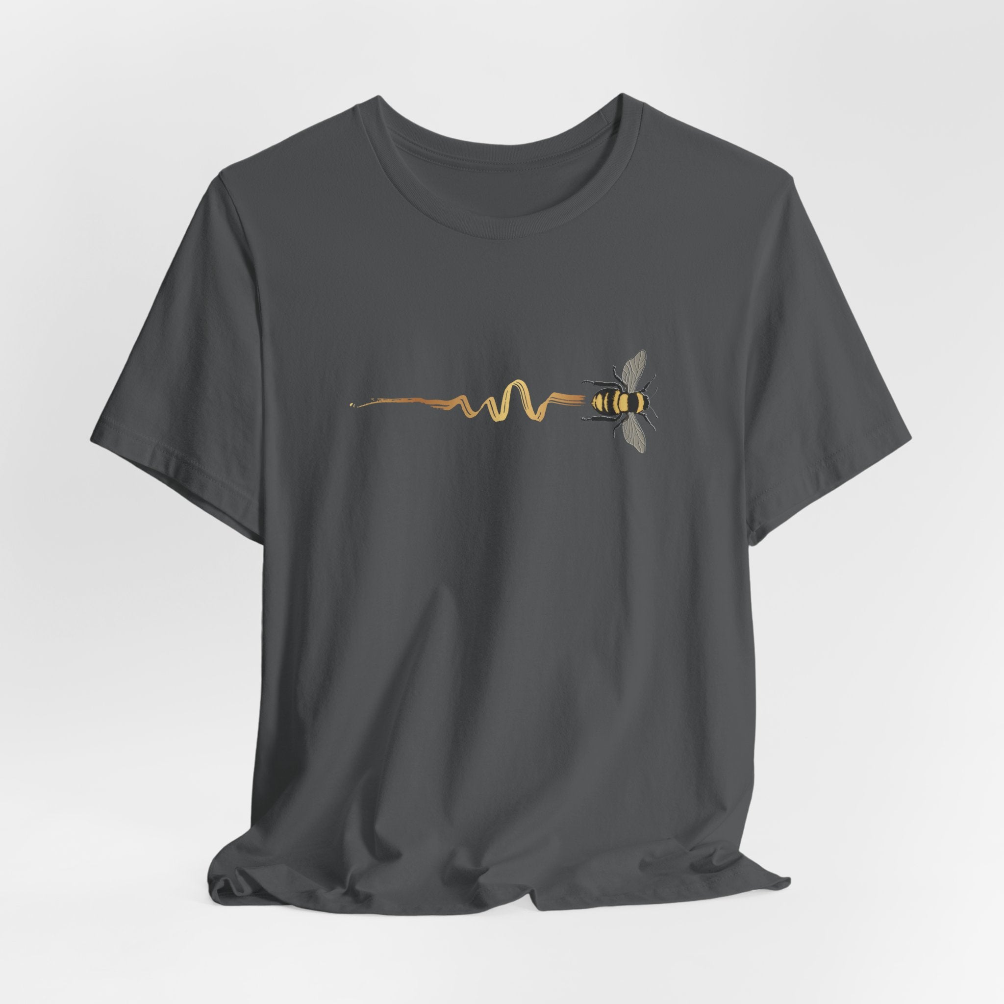 Green t-shirt with a bee and pulse line design on a light gray background